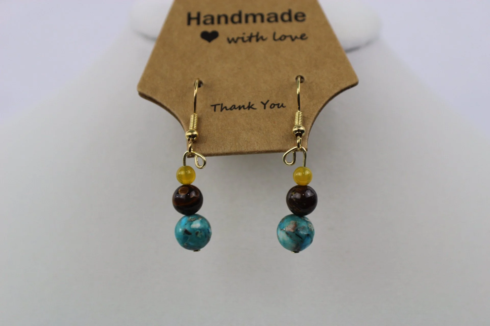 Sydnee yellow, brown turquois bead earring.JPG