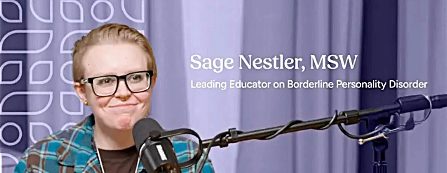 A woman with red hair, wearing glasses, is speaking into a microphone in front of a purple curtain. The text on the image reads: 'Sage Nestler, MSW, Leading Educator on Borderline Personality Disorder'.