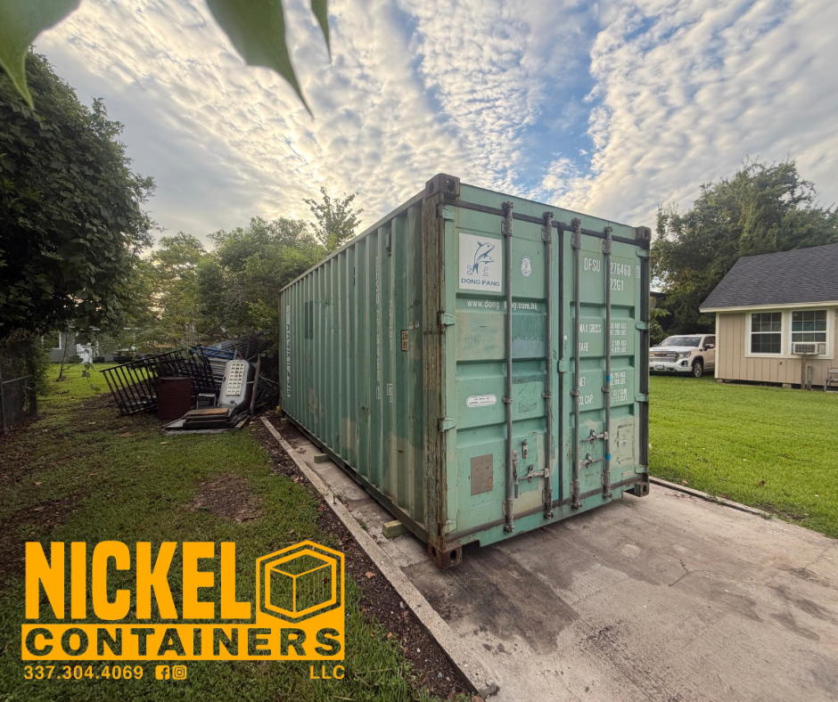 A green used 20 Foot shipping container delivered to a customer by Nickel Containers, LLC.