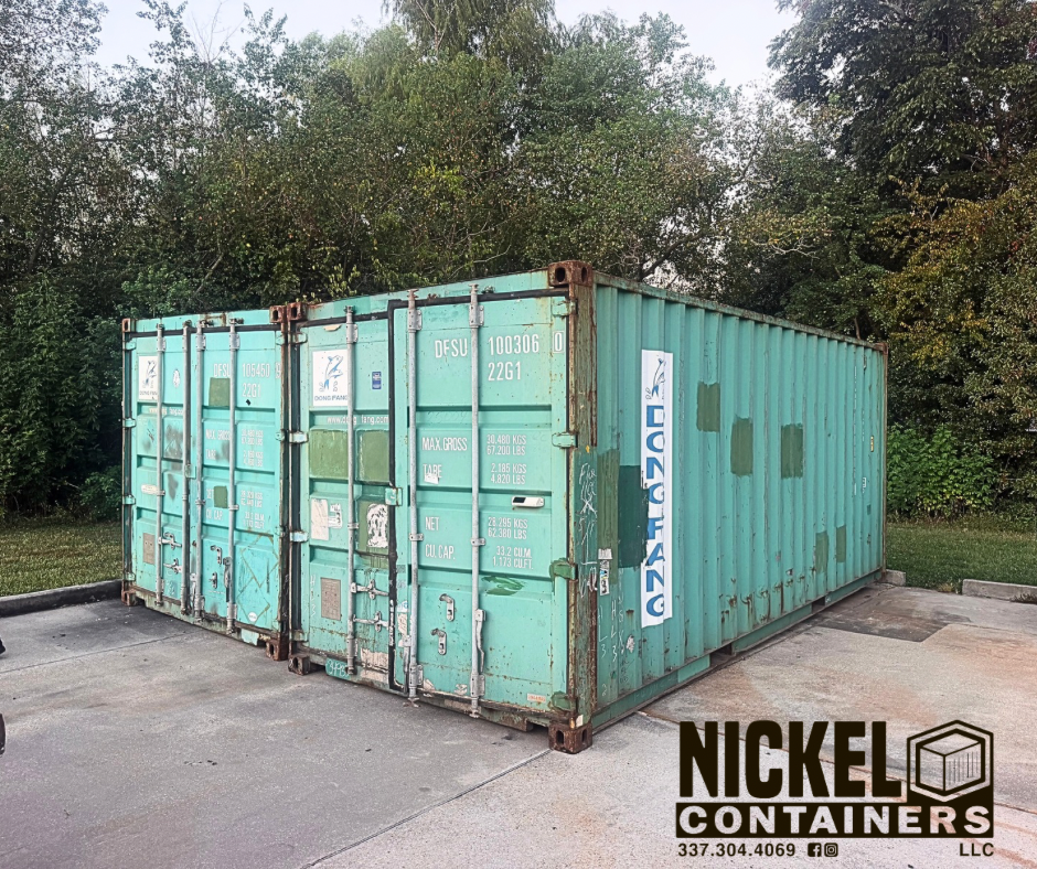 Two green used 20 FT shipping containers delivered to a fire department in Louisiana by Nickel Containers, LLC.