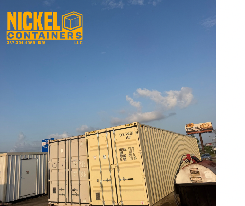 A yellow shipping container in a lot with other containers, with a sign for Nickel Containers LLC in the top left corner and a billboard in the background.