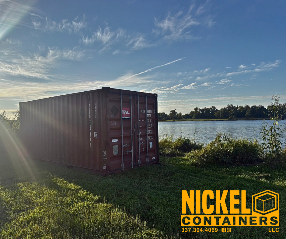 A red used 20 FT shipping container dropped off to a customer to be used as a base for advertising banners. 