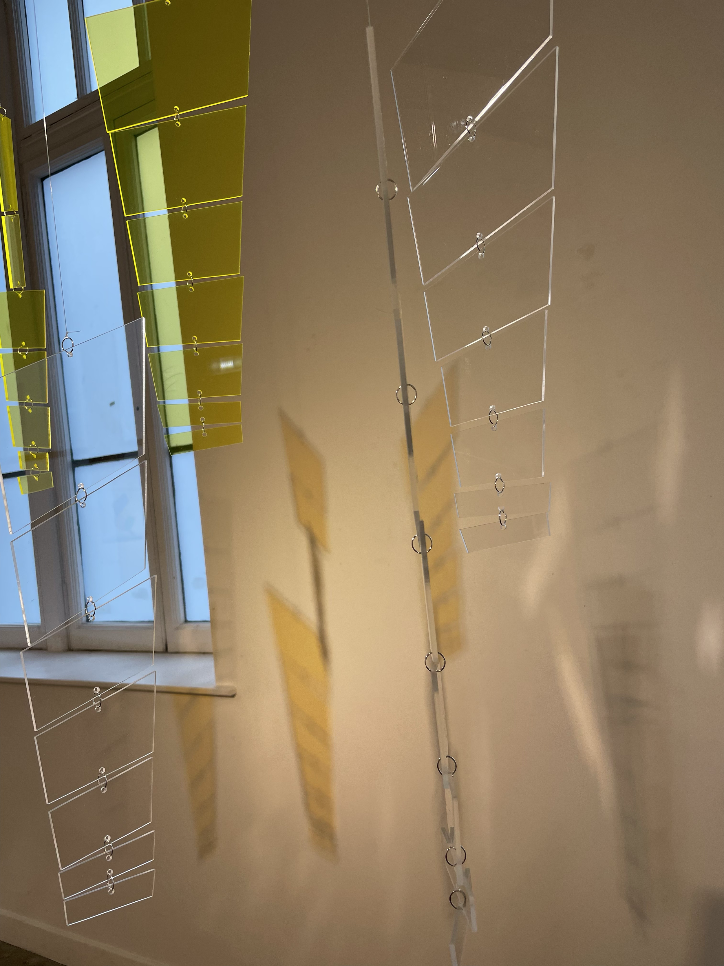 Suspended installation no 2. 72 laser cut perspex forms. Interrogating light, movement and space. Referencing shadows spilling through the ventilation windows of Union Street Washhouse onto yellow floor.
2026