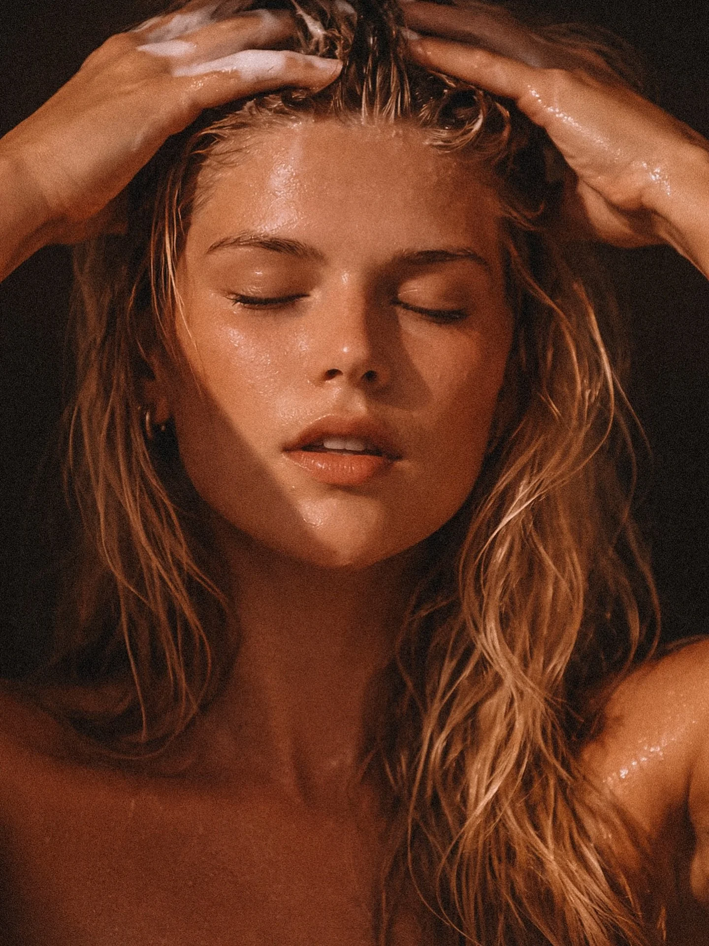 Golden hour. Steam rising. A wash day turned ritual.

Honey-infused cleanse. Fermented rice water. Botanicals that soften and fortify in the same breath. This is texture tended to with intention.

Romanticize the ritual. Reclaim the softness. Let eve