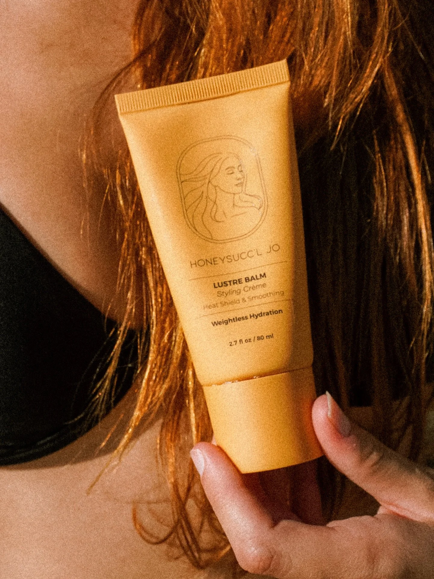 Golden hour, bottled.

LUSTRE BALM is our weightless styling cr&egrave;me for smooth, hydrated, frizz-free shine with heat protection for every finish. Soft hold. Lasting lustre.

#HONEYSUCCLJO #LustreBalm #LuxuryHaircare #HeatProtectant #FrizzContro