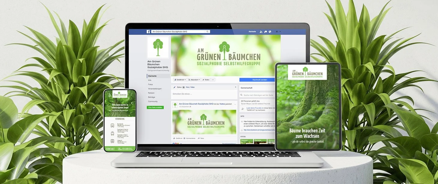 A laptop, smartphone, and tablet displaying the Facebook page and promotional materials of 'Am Grünen Bäumchen,' a self-help social phobia support group, with green plant backgrounds.