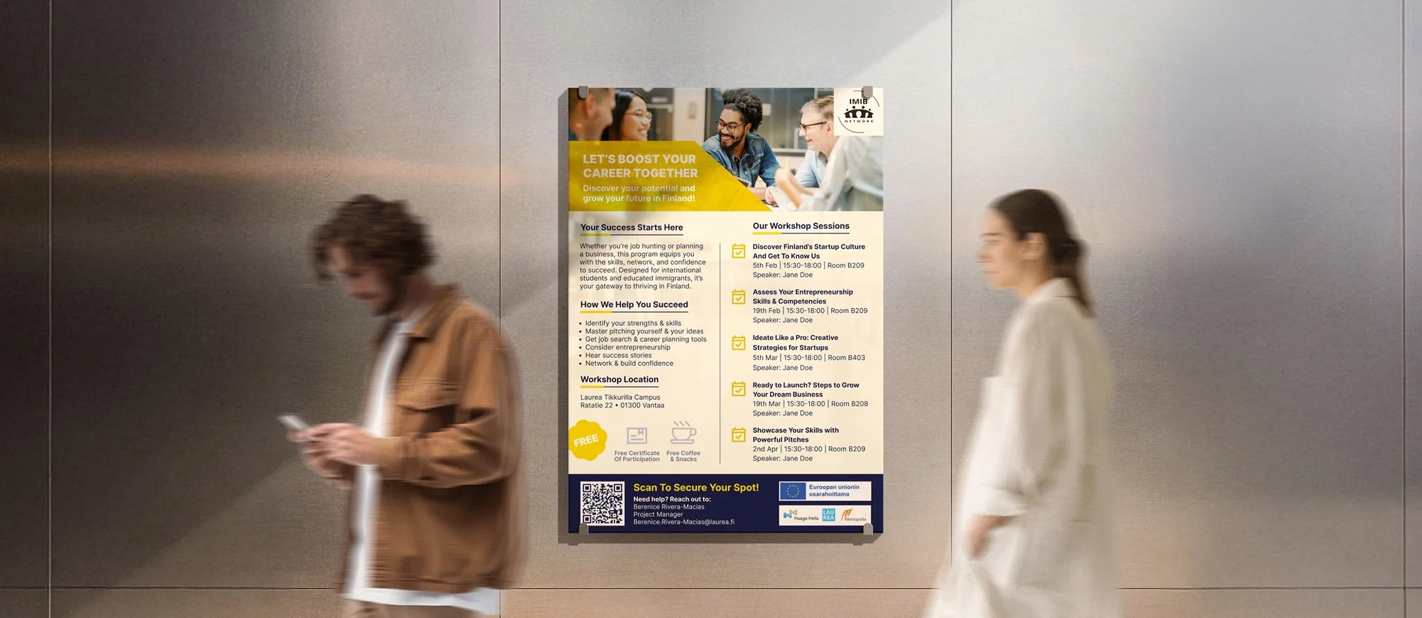 A poster on a wall advertising a career development workshop with information on sessions, location, and speakers, with two people walking past it in an indoor setting.