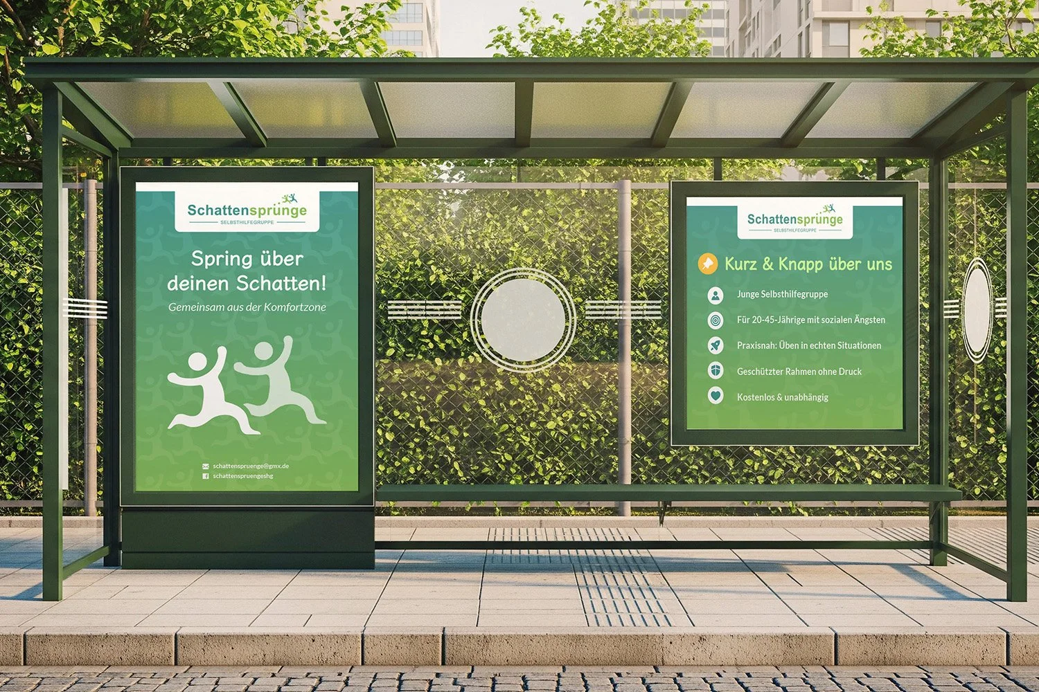 Bus stop shelter with two green informational posters about a self-help group called Schattensprünge, featuring text and icons, with a background of trees and city buildings.
