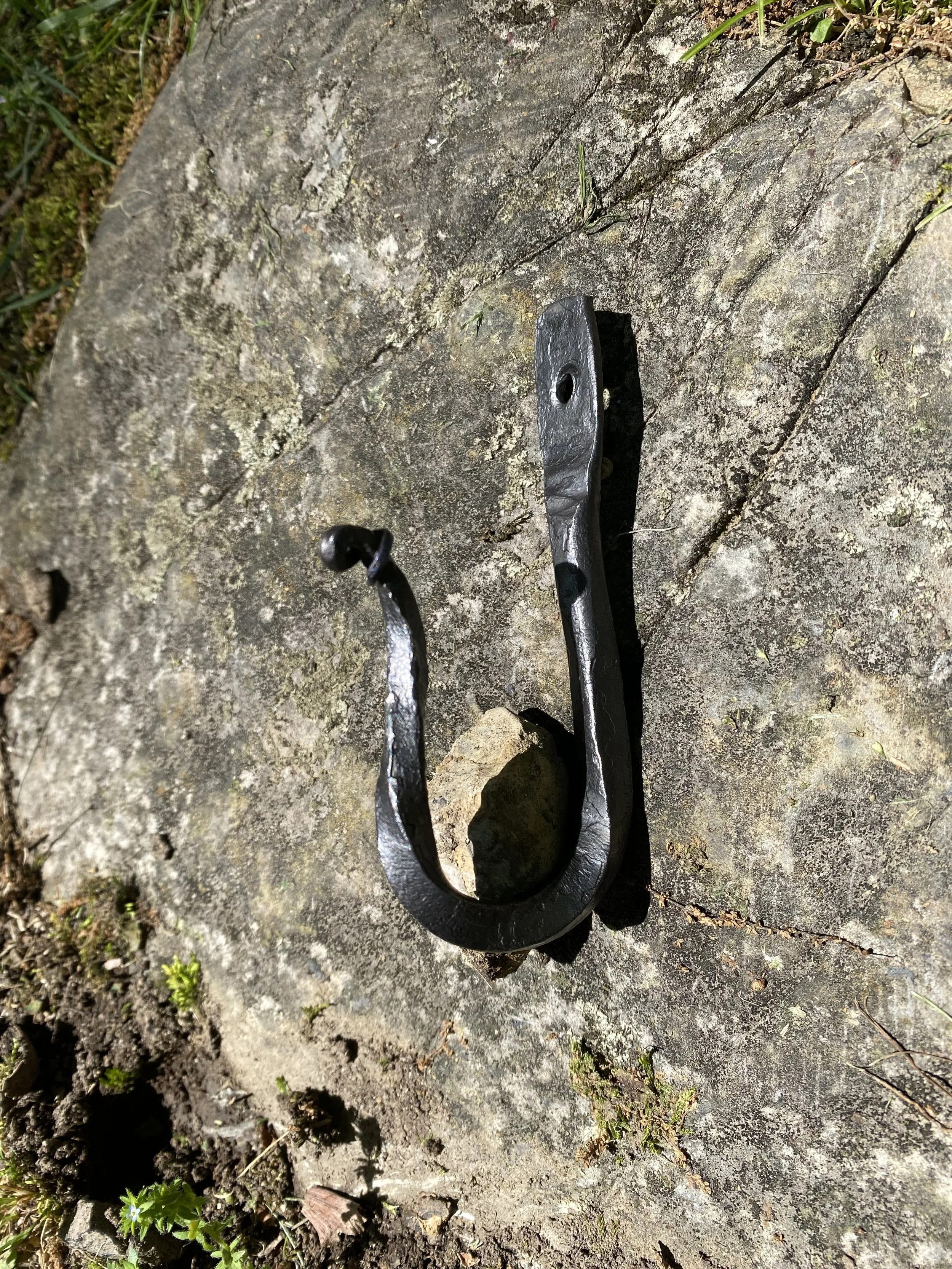 Elaborate twisted J-hook