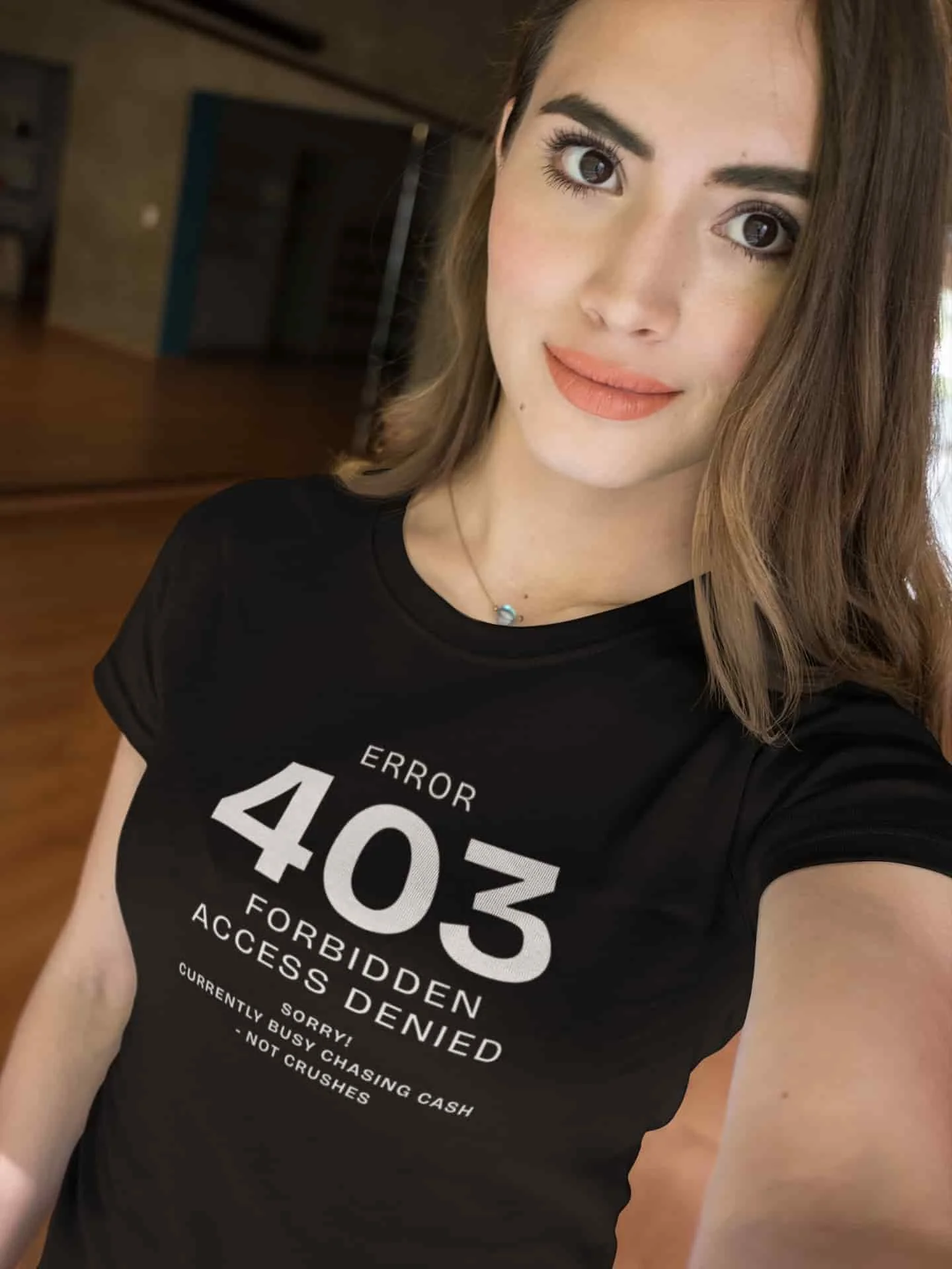 Model wearing black 'Error 403 Forbidden' T-shirt