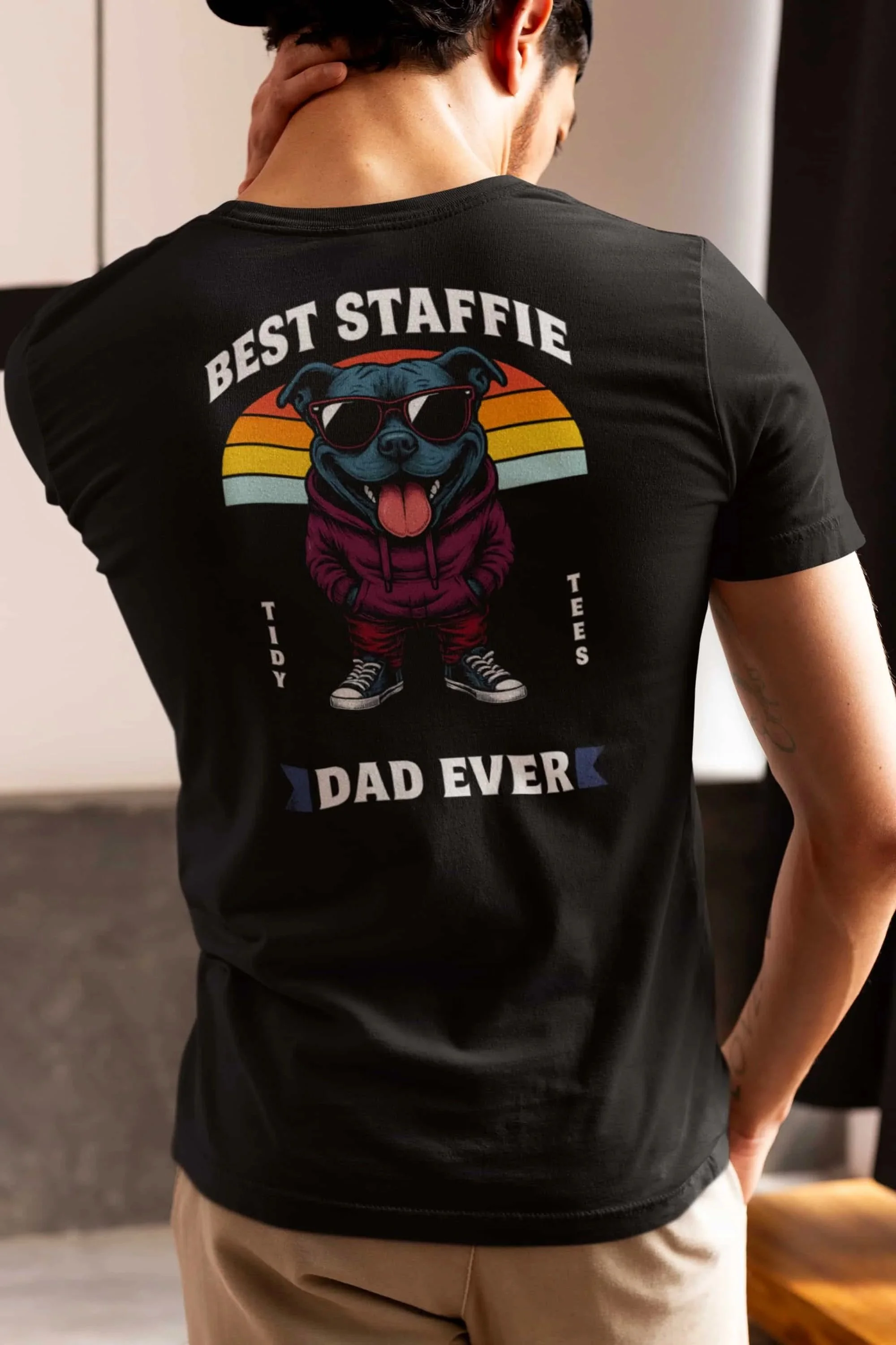 back view of man wearing 'best staffie dad ever' tee mockup