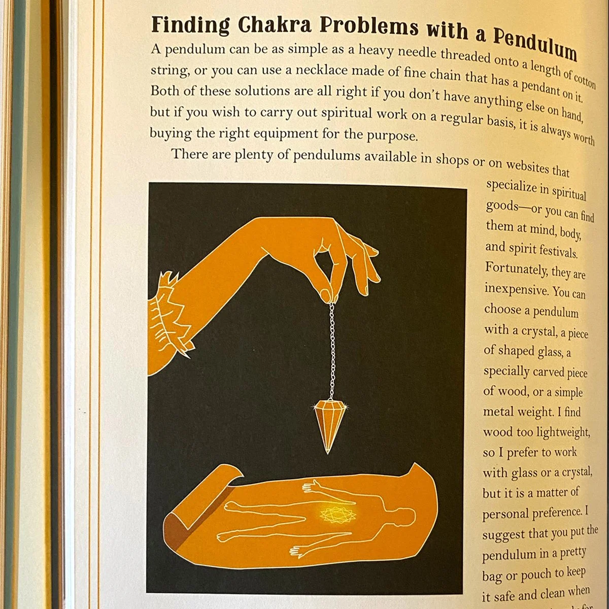 hand holding pendulum over diagram of chakras, interior book page, illustrated by Terry Marks