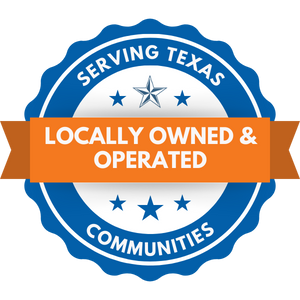 A circular blue badge with white text that says 'Serving Texas Communities.' An orange banner across the middle reads 'Locally Owned & Operated.'