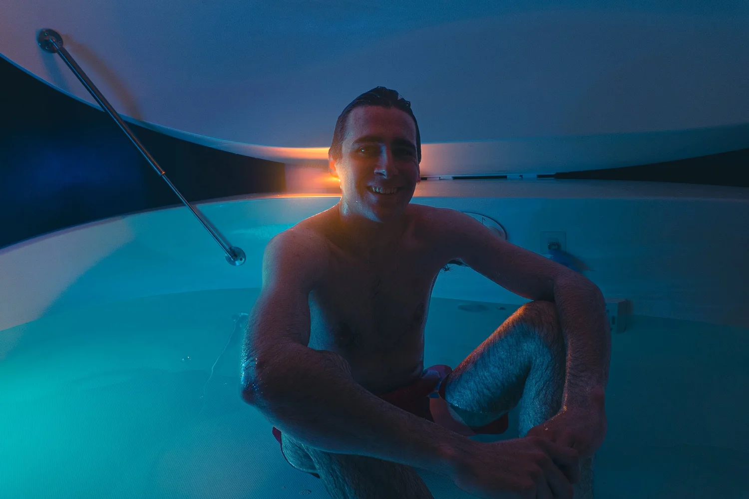 A member sitting in a float tank