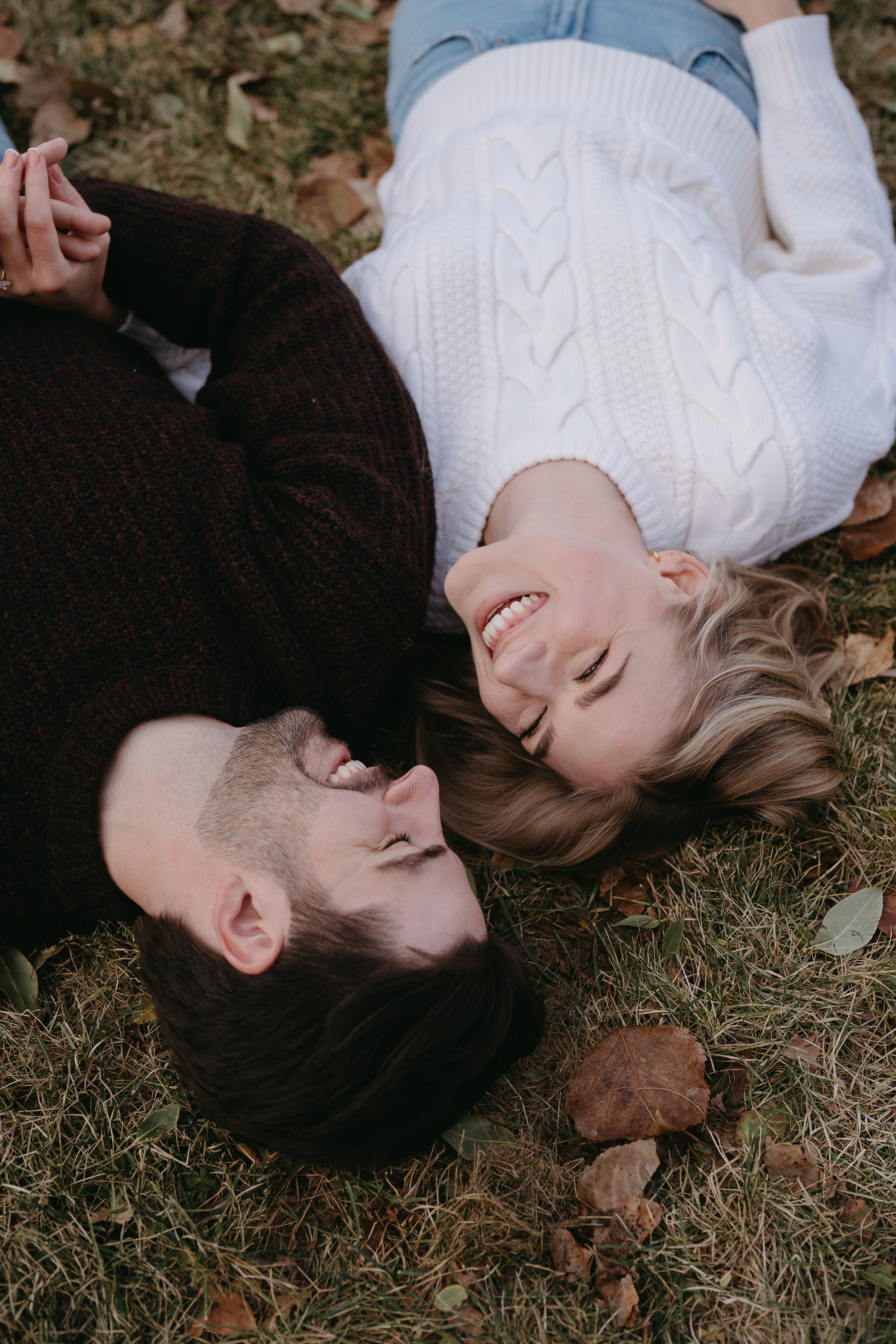 Calgary, Alberta. Engagement Session of couple in Confederation Park, shot by KC Photography