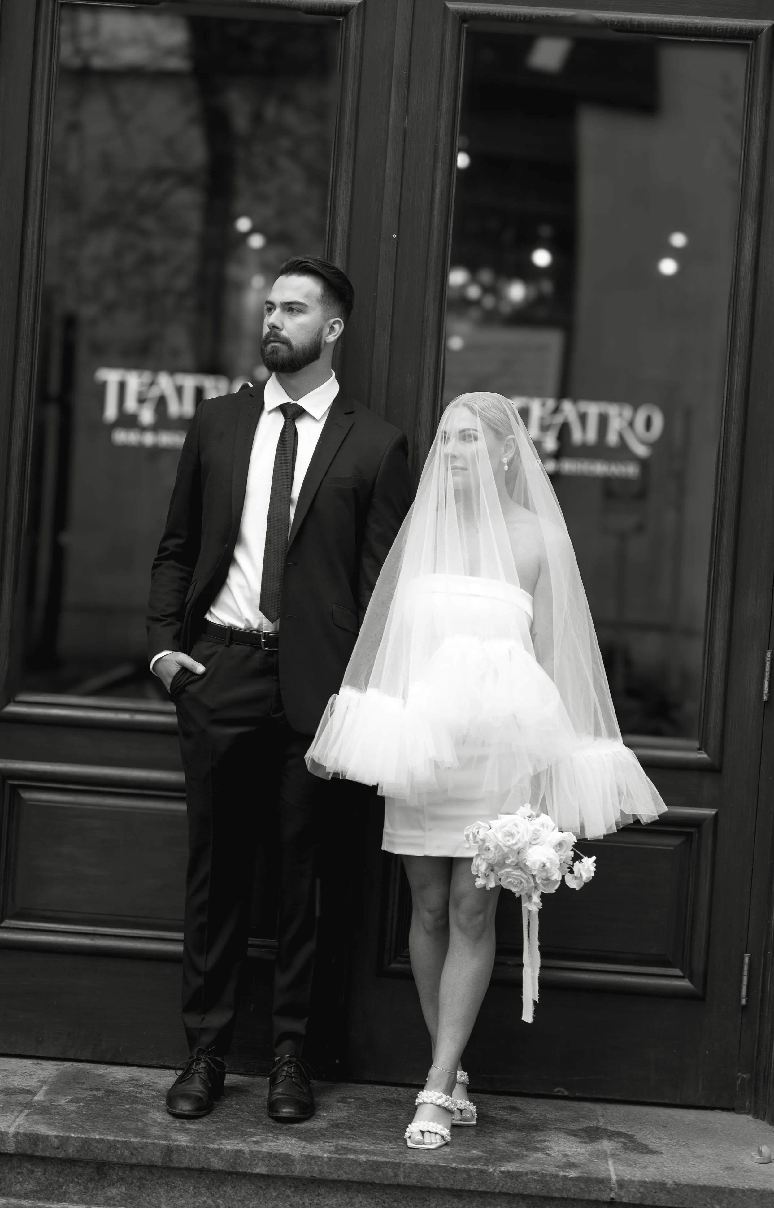 bride and groom in calgary downtown alberta shot my kc photography.  Lottie weddings.