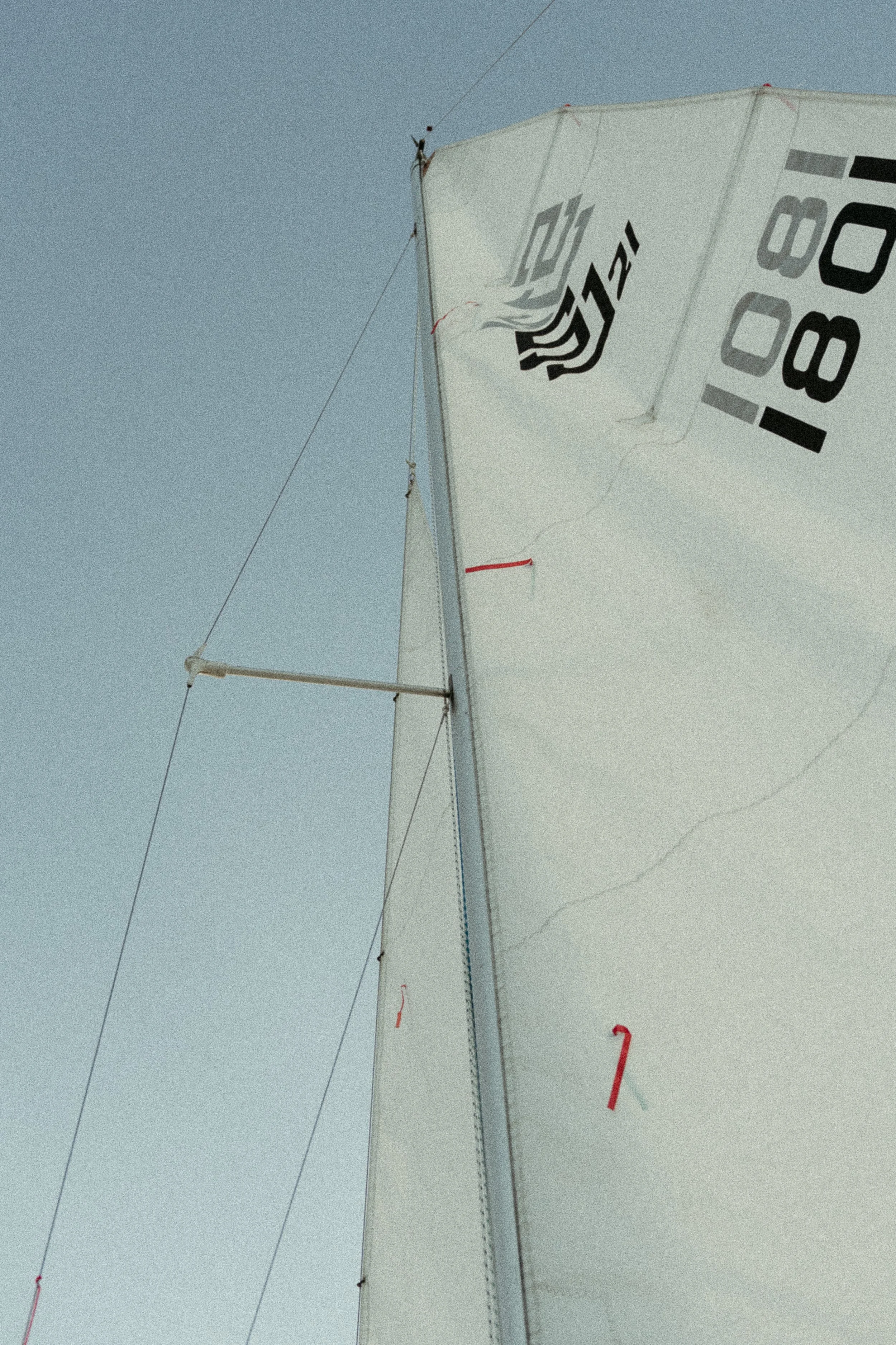 The sail of a sailing boat. August 2025 Elopement/Wedding Sailboat/Sailing Session with KC Photography