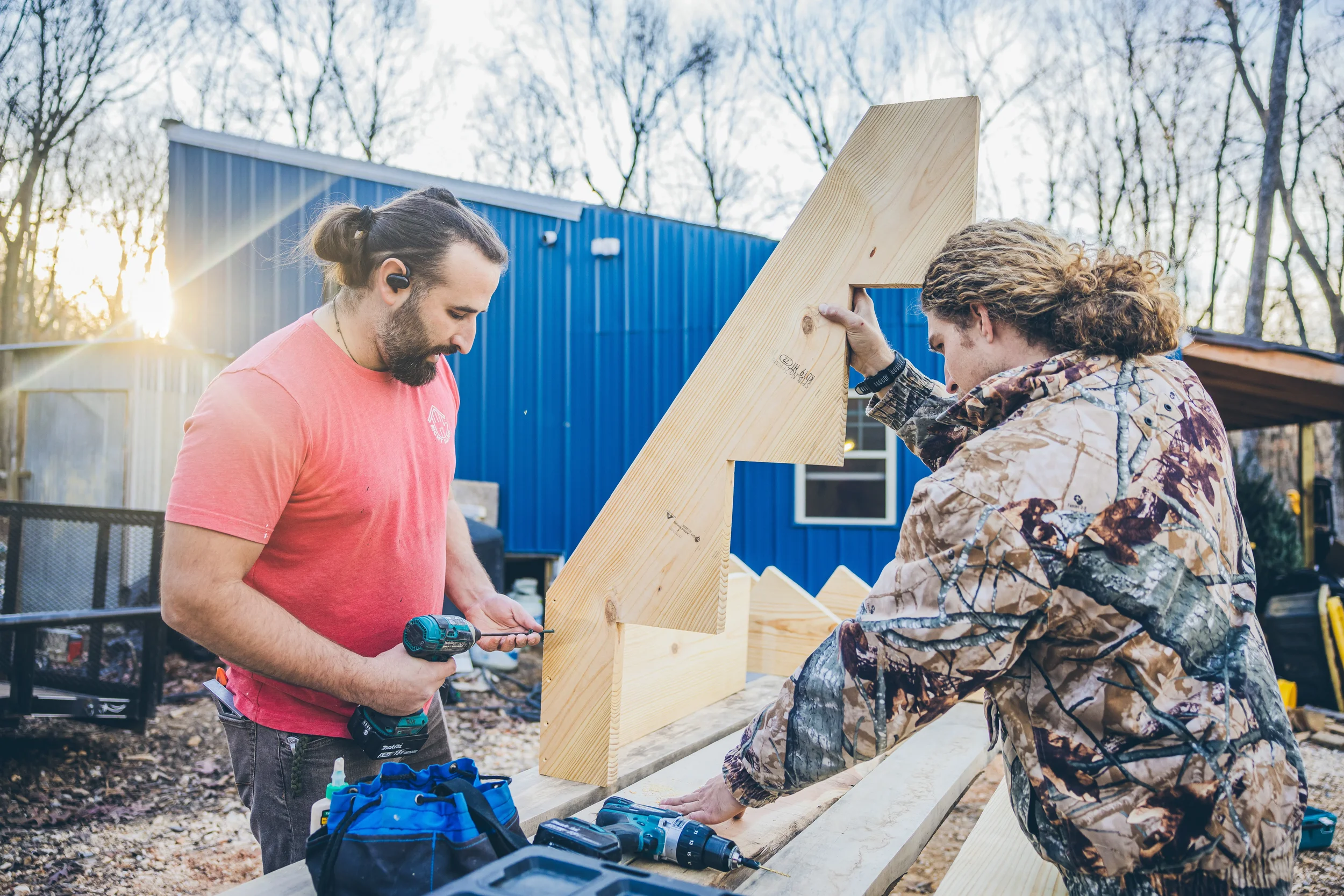 Right Hand Man technician performing precision carpentry door installation in Rogers AR