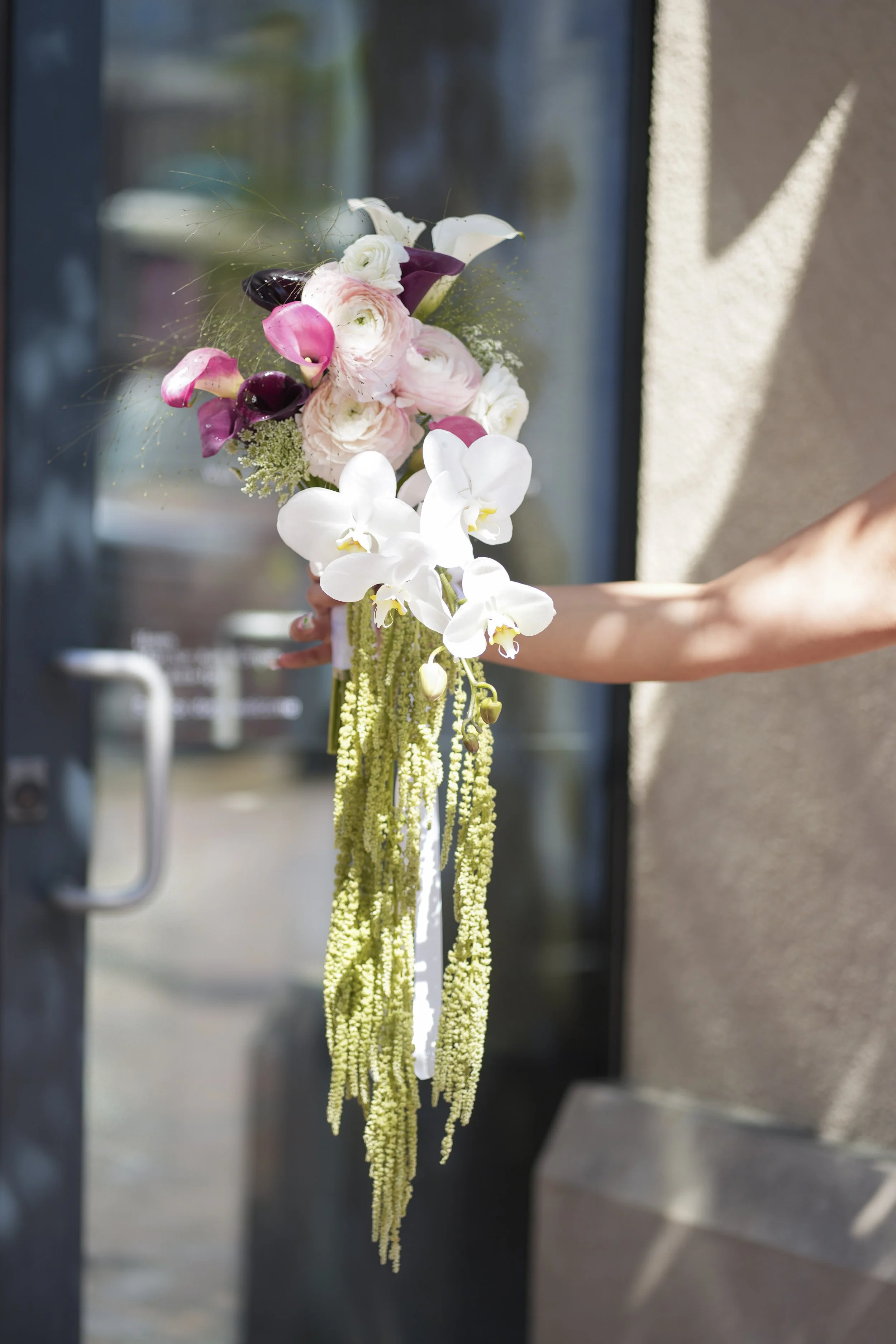 Bridal Bouquet Cascading Orchid $375
Bride - " Deep, Pinks, Greens, Whimsical"