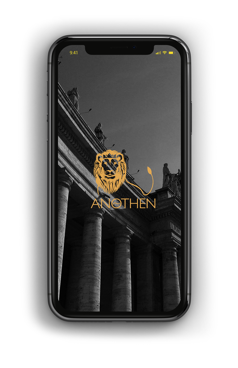 A smartphone displaying a logo with a lion's head and mane in gold, the word 'ANOTHEN' underneath, set against a grayscale background of ancient columns and statues.