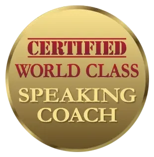 Gold circular badge with red and cream text reading 'Certified World Class Speaking Coach'.