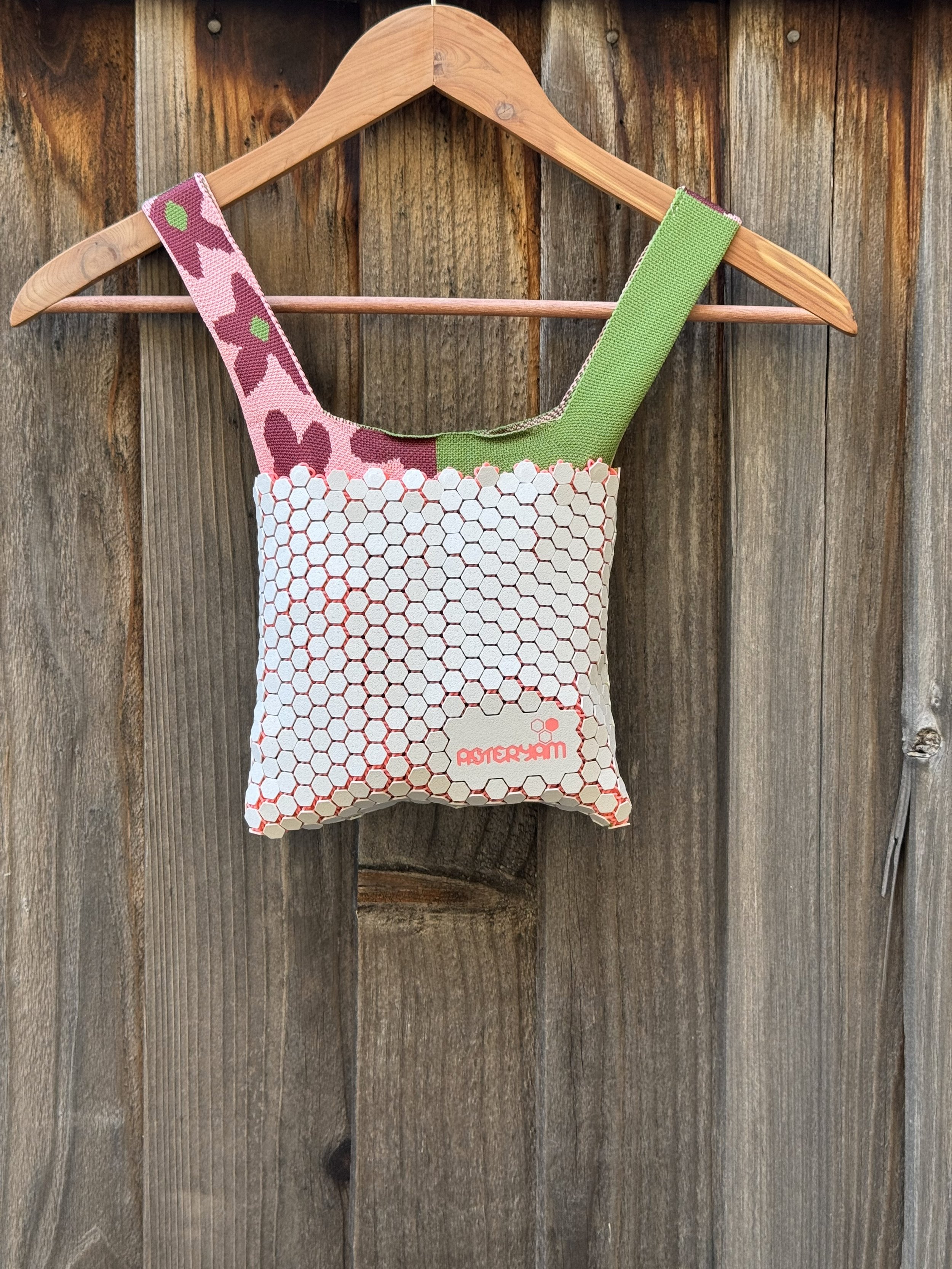 hexa-sling-knitted-inner-bag-pink-green-strap-lifestyle-shot.jpg