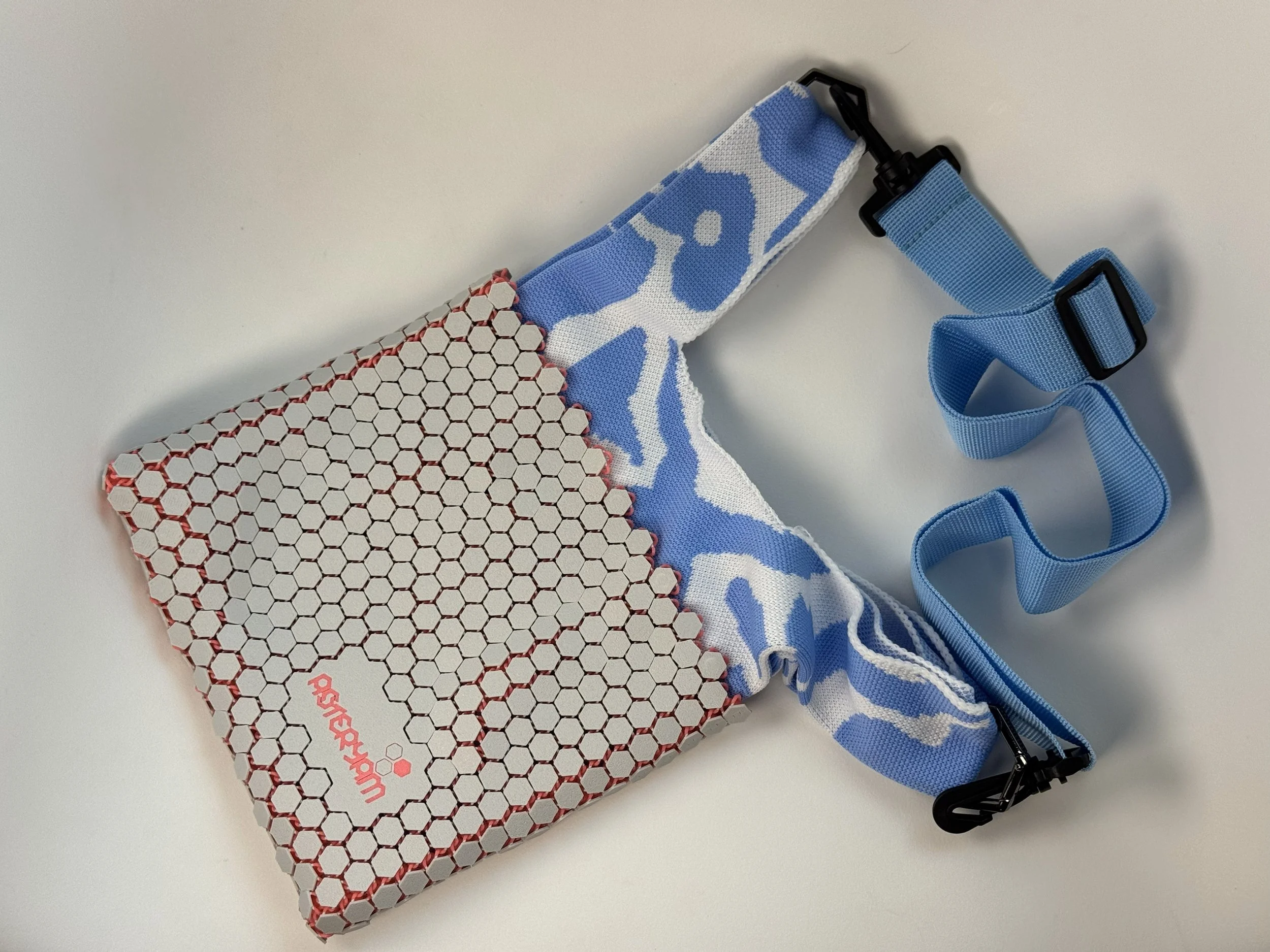 Side view of Hexa Sling bag showing the depth of the 3D printed mesh and knitted interior.