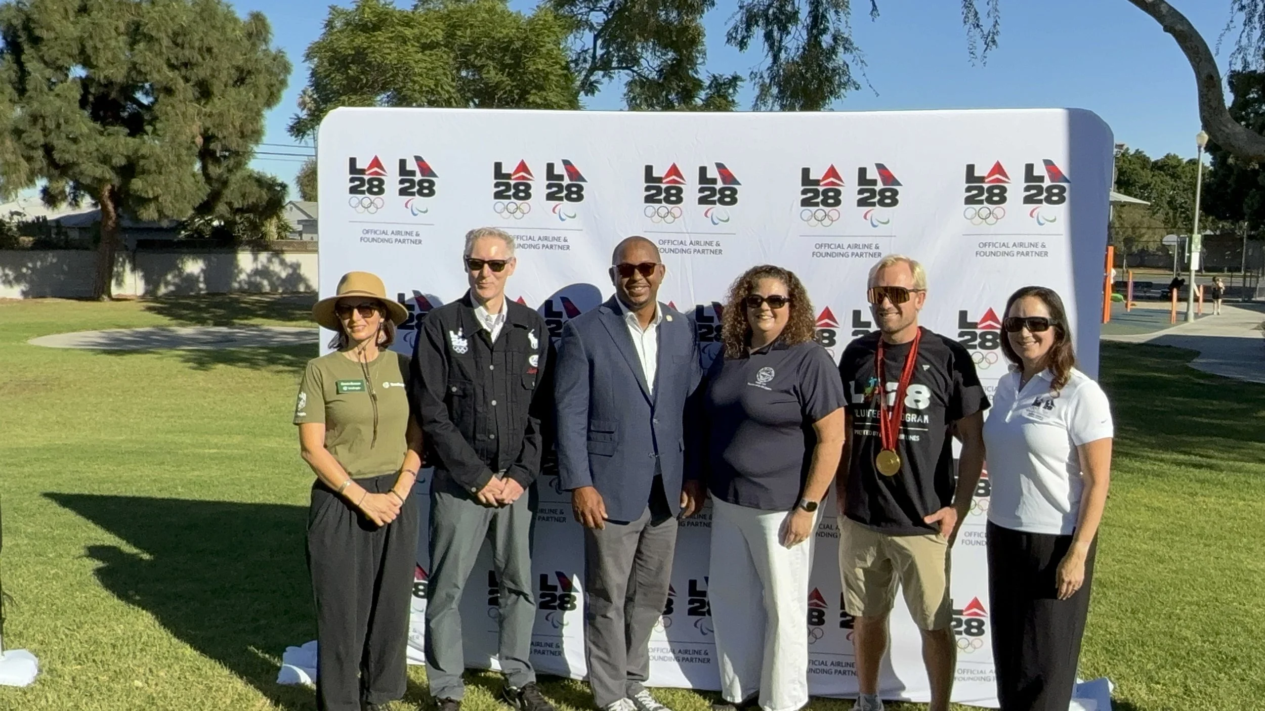 Justin Schoenefeld teams up with Delta and LA 2028 Volunteer Program to plant the 250th tree of 1000 before the Summer Olympic and Paralympic Games