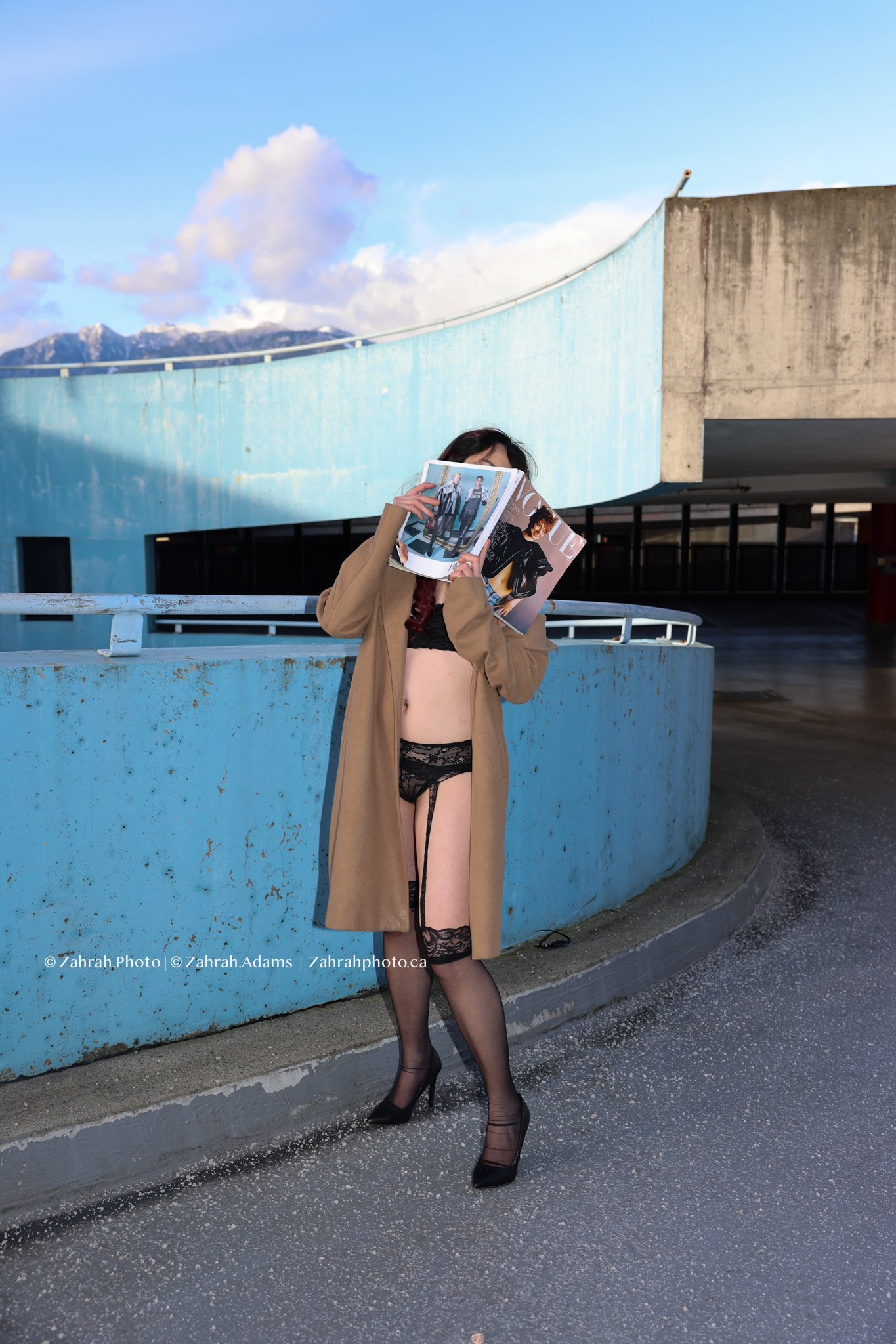 Cinematic boudoir photography by Zahrah Photo capturing femininity, confidence, fashion inspired styling, and atmospheric storytelling through editorial rooftop portraiture in Vancouver.