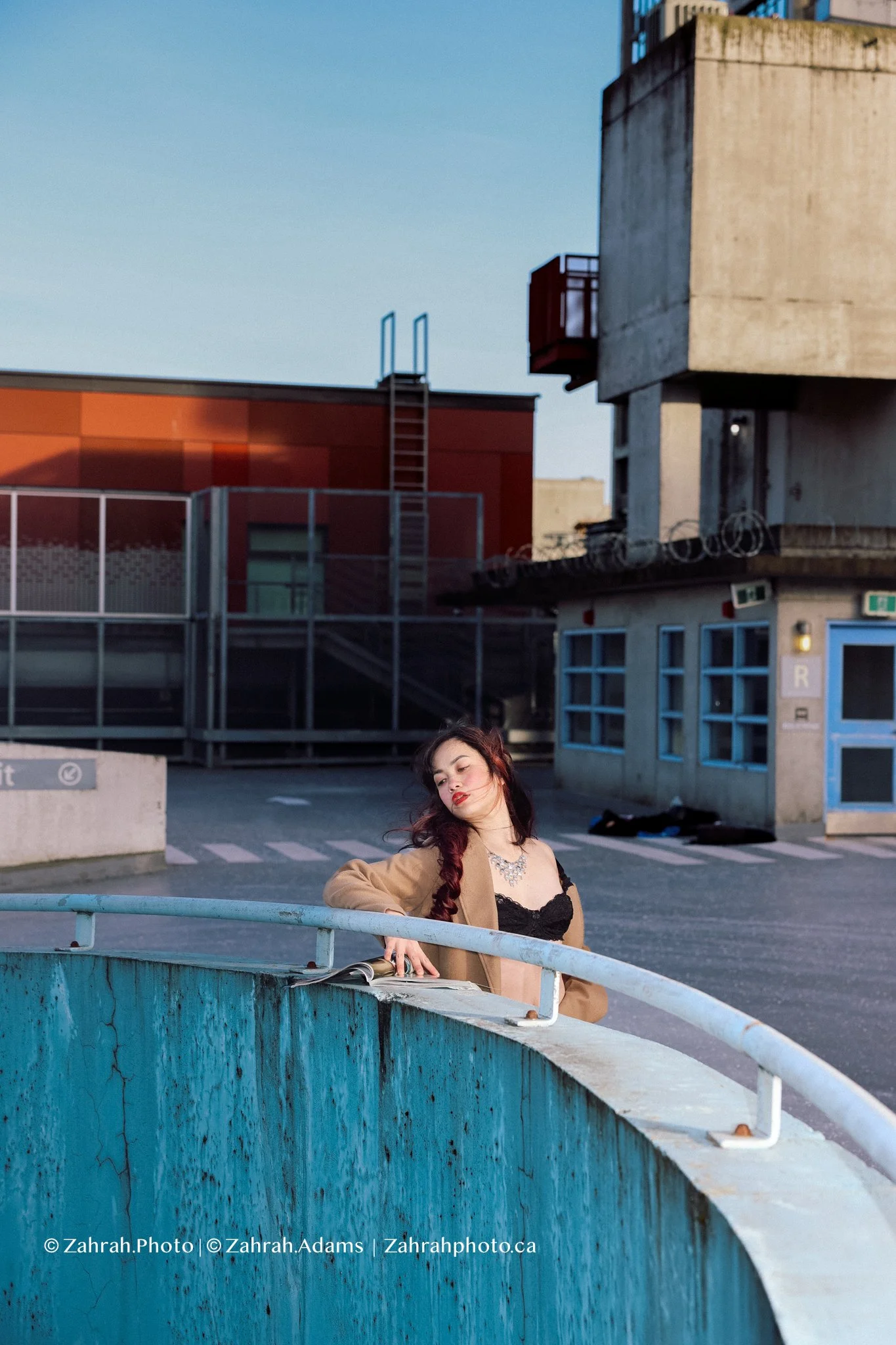 Cinematic boudoir photography by Zahrah Photo capturing femininity, confidence, fashion inspired styling, and atmospheric storytelling through editorial rooftop portraiture in Vancouver.