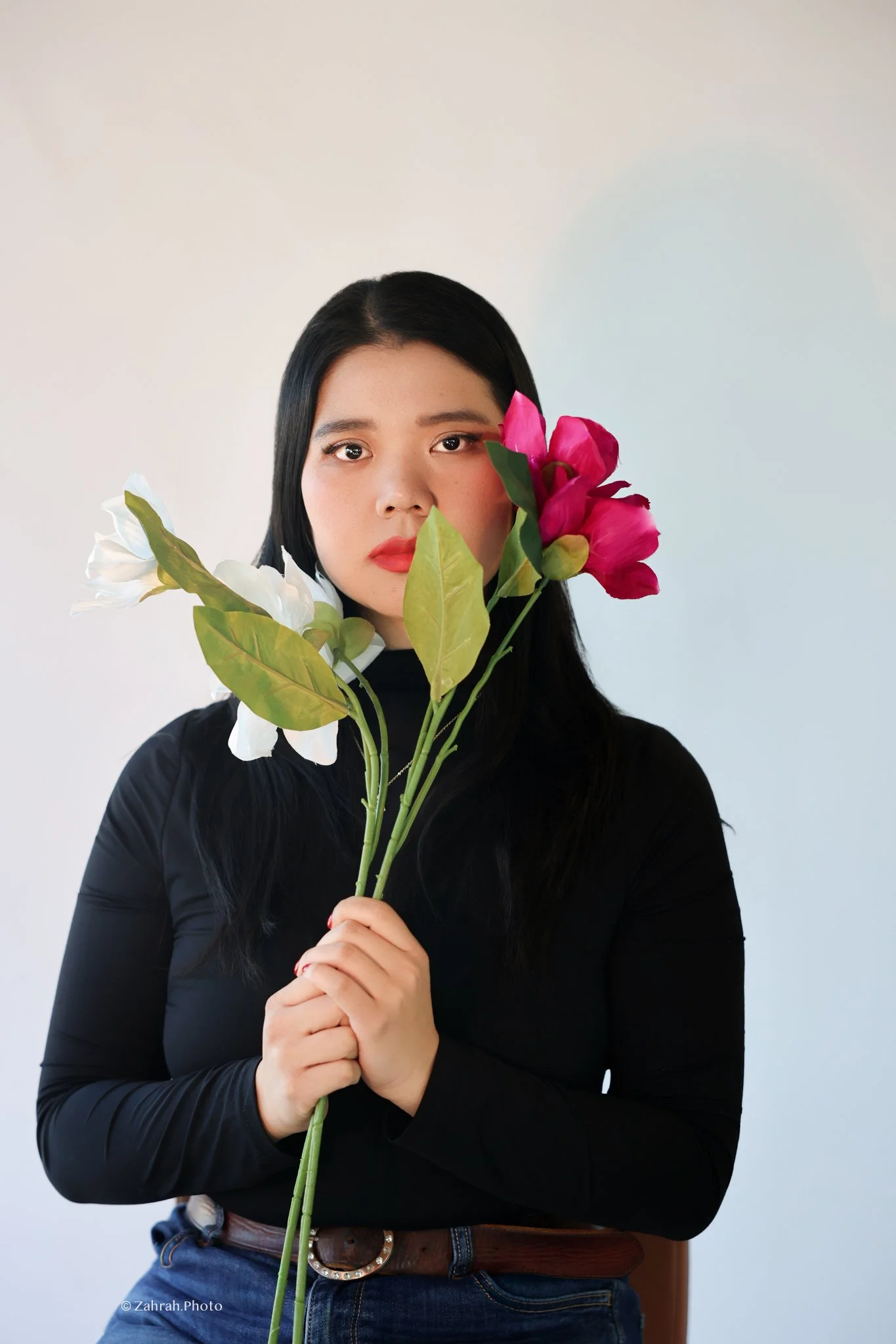 Soft editorial beauty portrait by Zahrah Photo exploring femininity, colour, and cinematic storytelling.