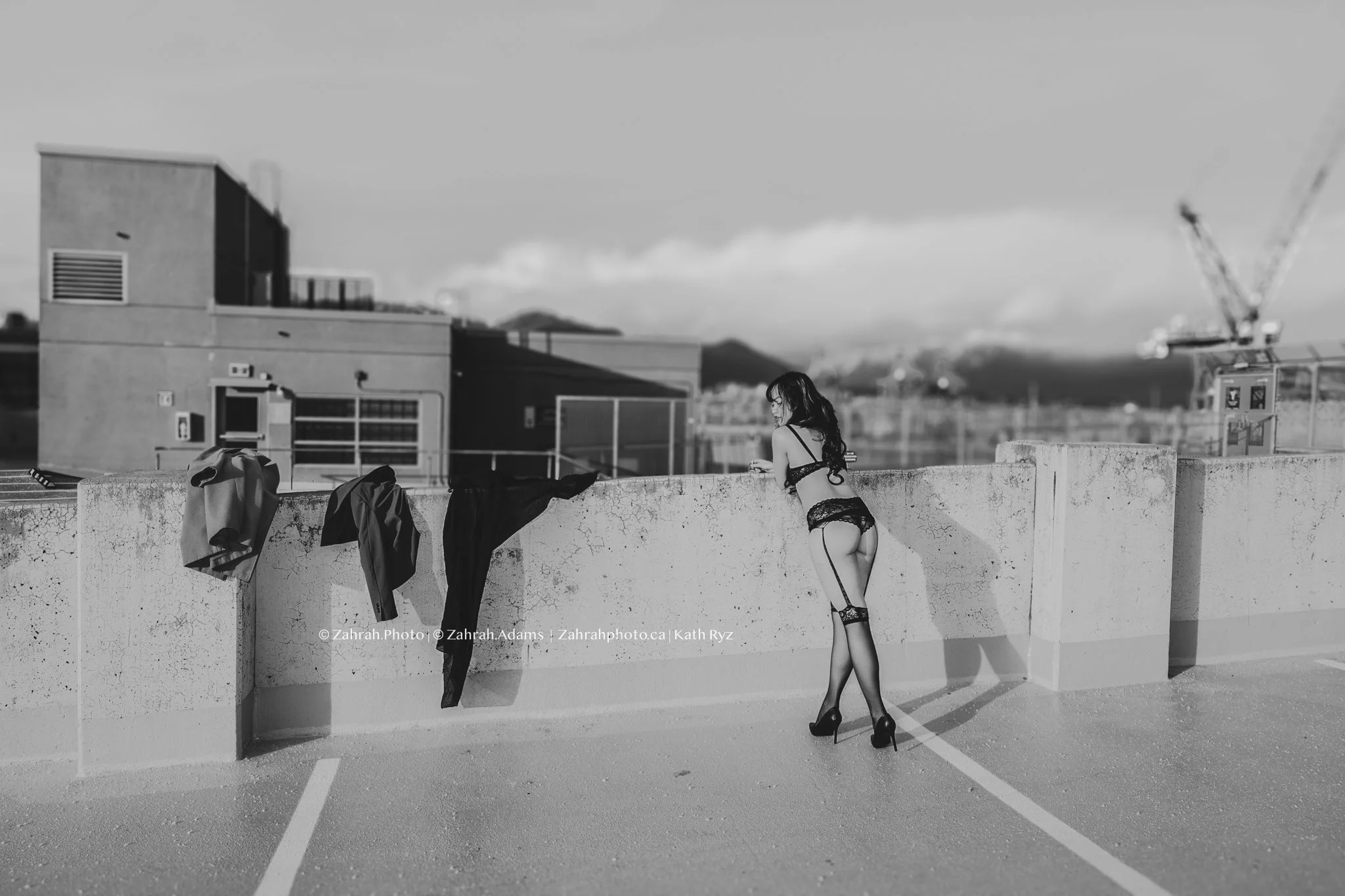 Cinematic boudoir photography by Zahrah Photo capturing femininity, confidence, fashion inspired styling, and atmospheric storytelling through editorial rooftop portraiture in Vancouver.