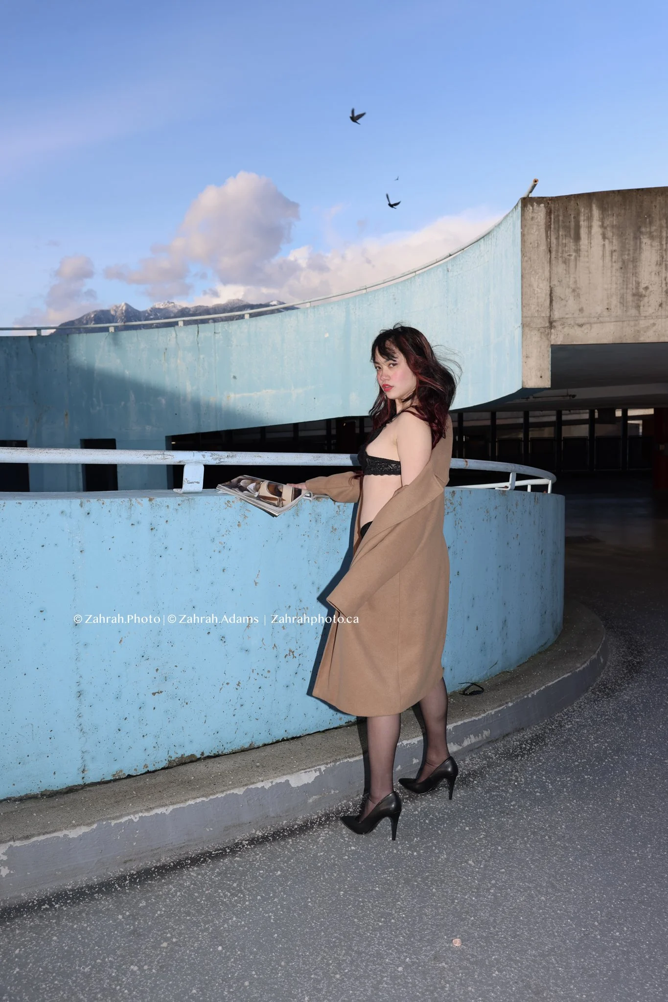 Cinematic boudoir photography by Zahrah Photo capturing femininity, confidence, fashion inspired styling, and atmospheric storytelling through editorial rooftop portraiture in Vancouver.
