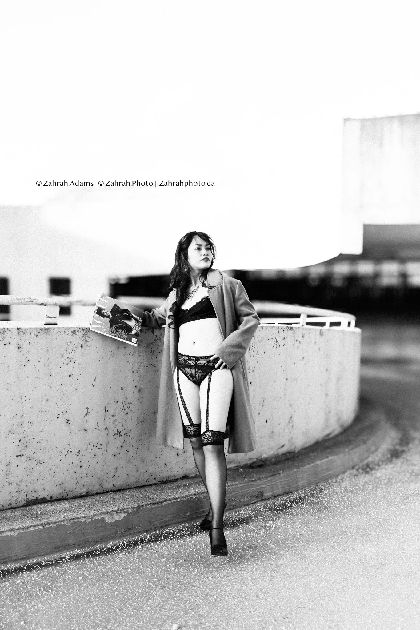 Cinematic boudoir photography by Zahrah Photo capturing femininity, confidence, fashion inspired styling, and atmospheric storytelling through editorial rooftop portraiture in Vancouver.