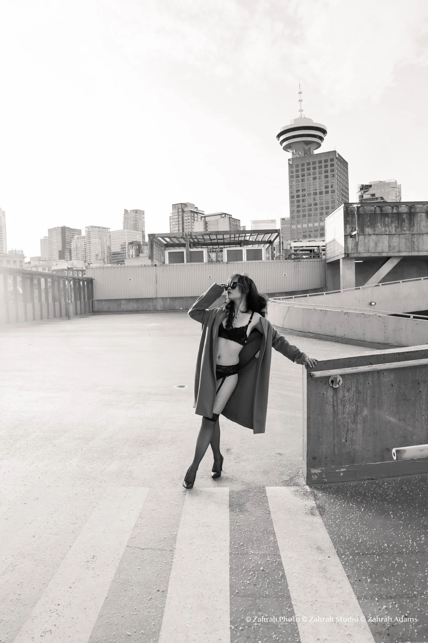 Cinematic boudoir photography by Zahrah Photo capturing femininity, confidence, fashion inspired styling, and atmospheric storytelling through editorial rooftop portraiture in Vancouver.