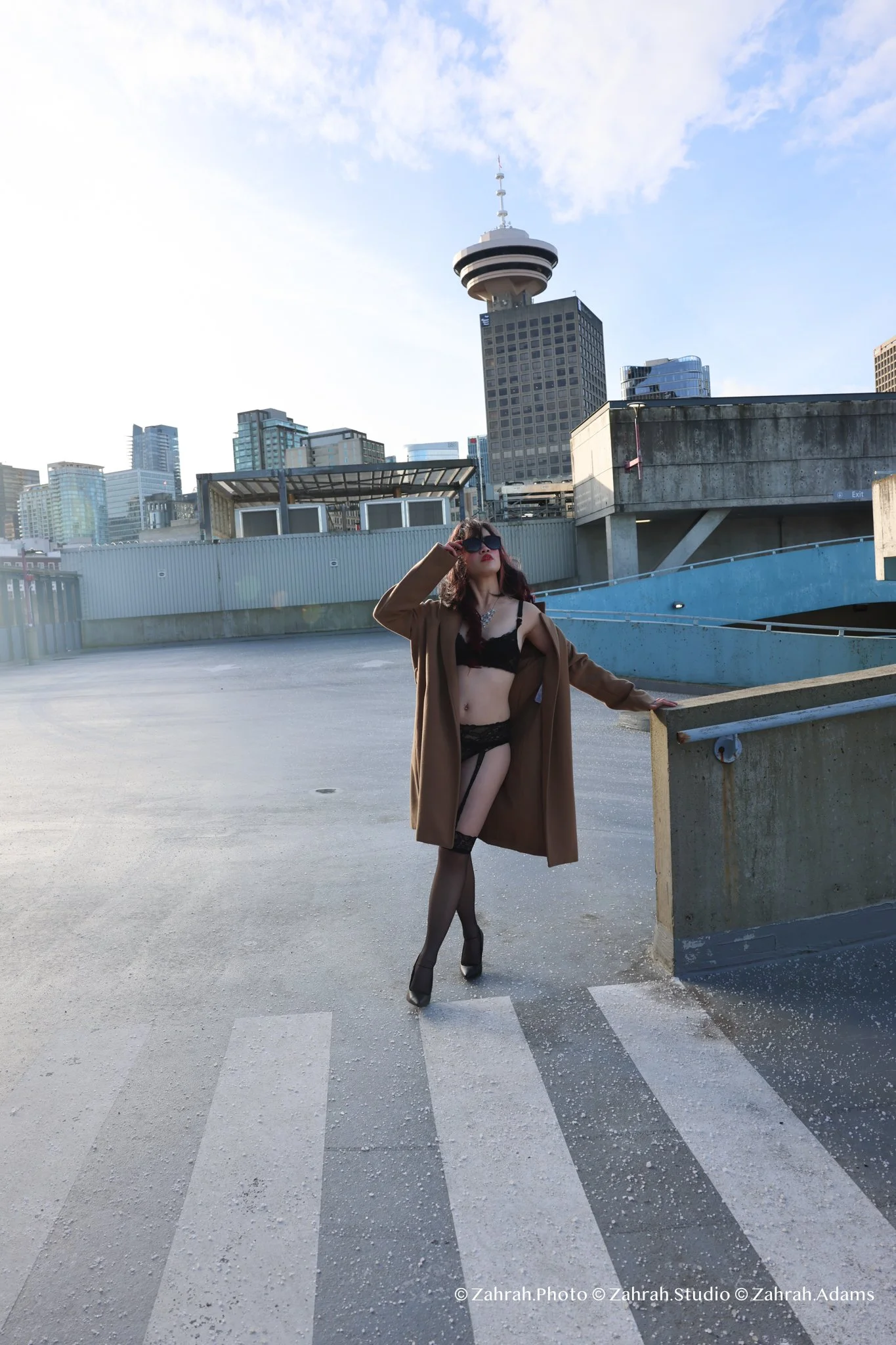 Cinematic boudoir photography by Zahrah Photo capturing femininity, confidence, fashion inspired styling, and atmospheric storytelling through editorial rooftop portraiture in Vancouver.