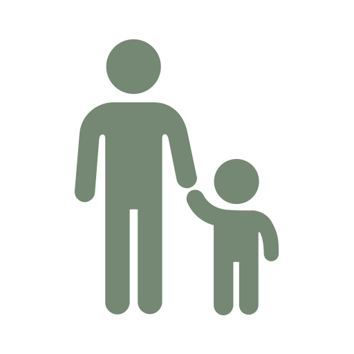 Silhouette of an adult holding a child's hand