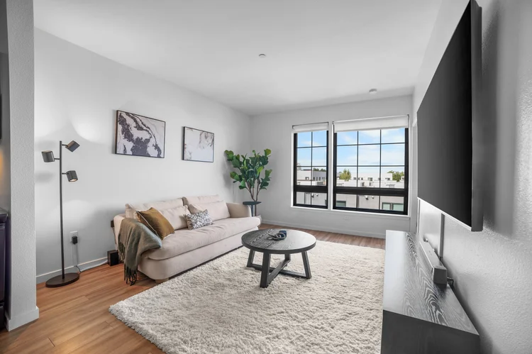 The Riverfront Loft hero — West Sacramento skyline residence