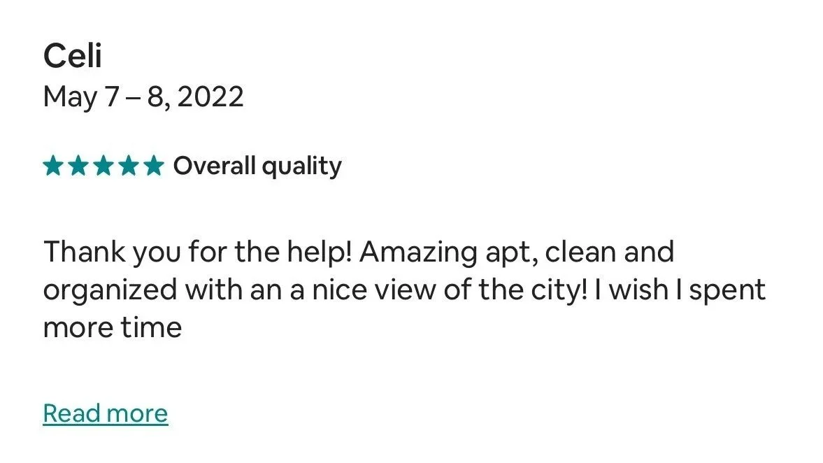 Customer review for Celi with a five-star rating, dated May 7-8, 2022, praising the apartment's view of the city and cleanliness.