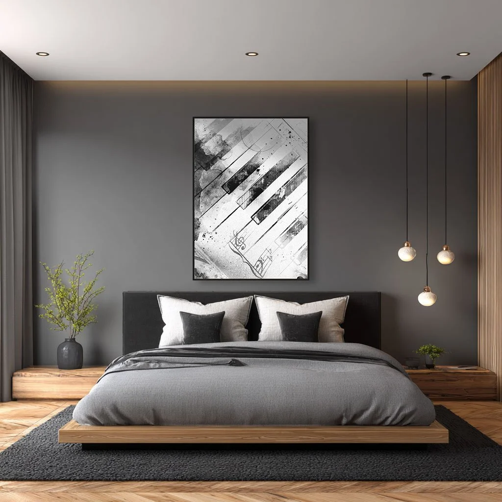 A very large black and white abstract picture above a black white and grey bed.