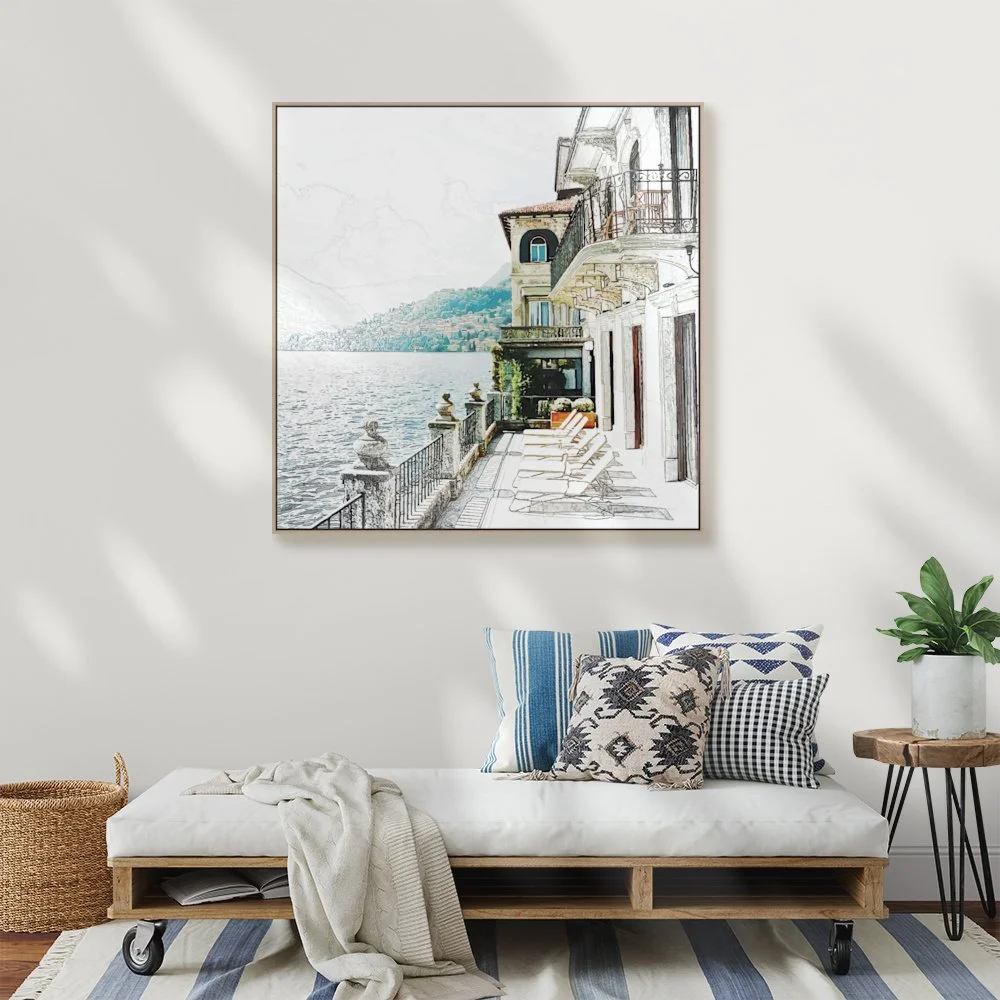 Echoes is framed wall art print in an interior setting of a villa terrace beside a lake