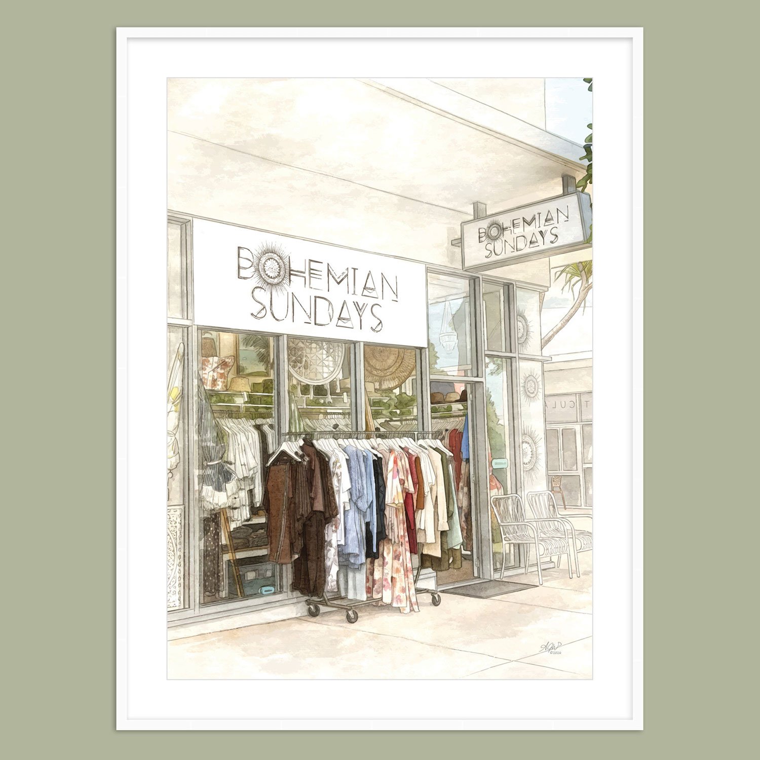 Bohemian Sunday wall art print in white frame on green wall.