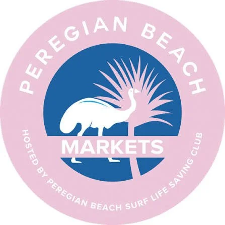 Logo for Peregian Beach Markets with a white emu and palm tree on a pink and blue background.
