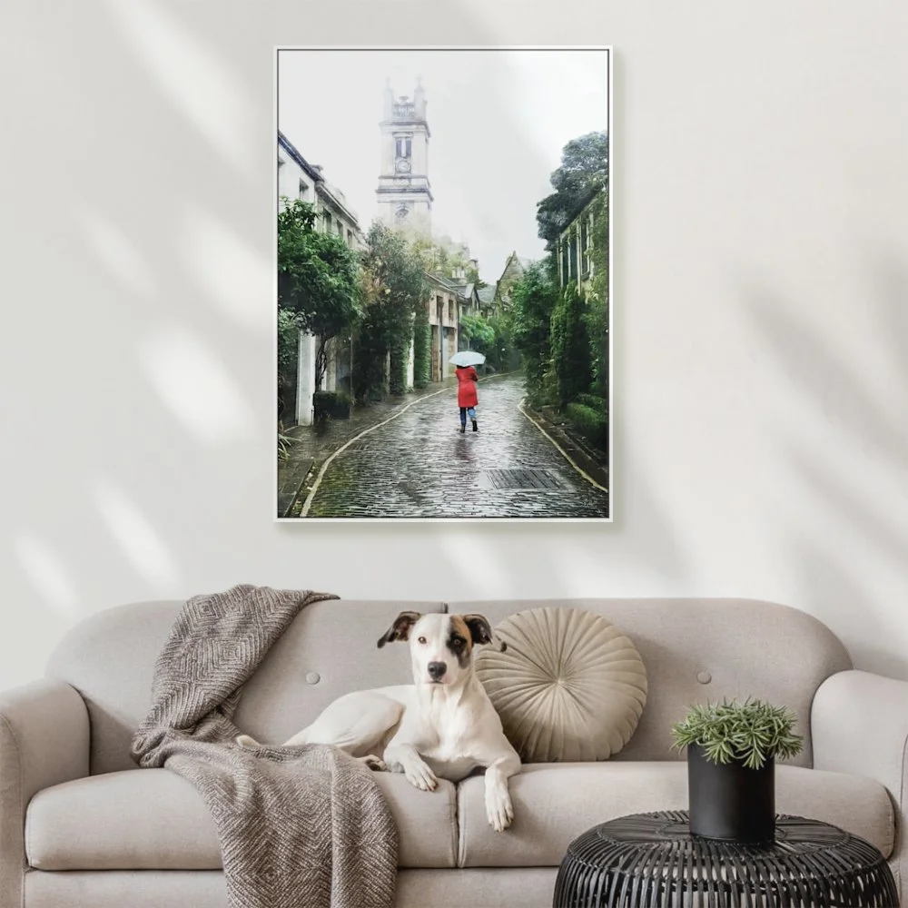 Framed digital wall art print of Circus Lane in Edinburgh on a rainy day. Woman walking in bright red coat