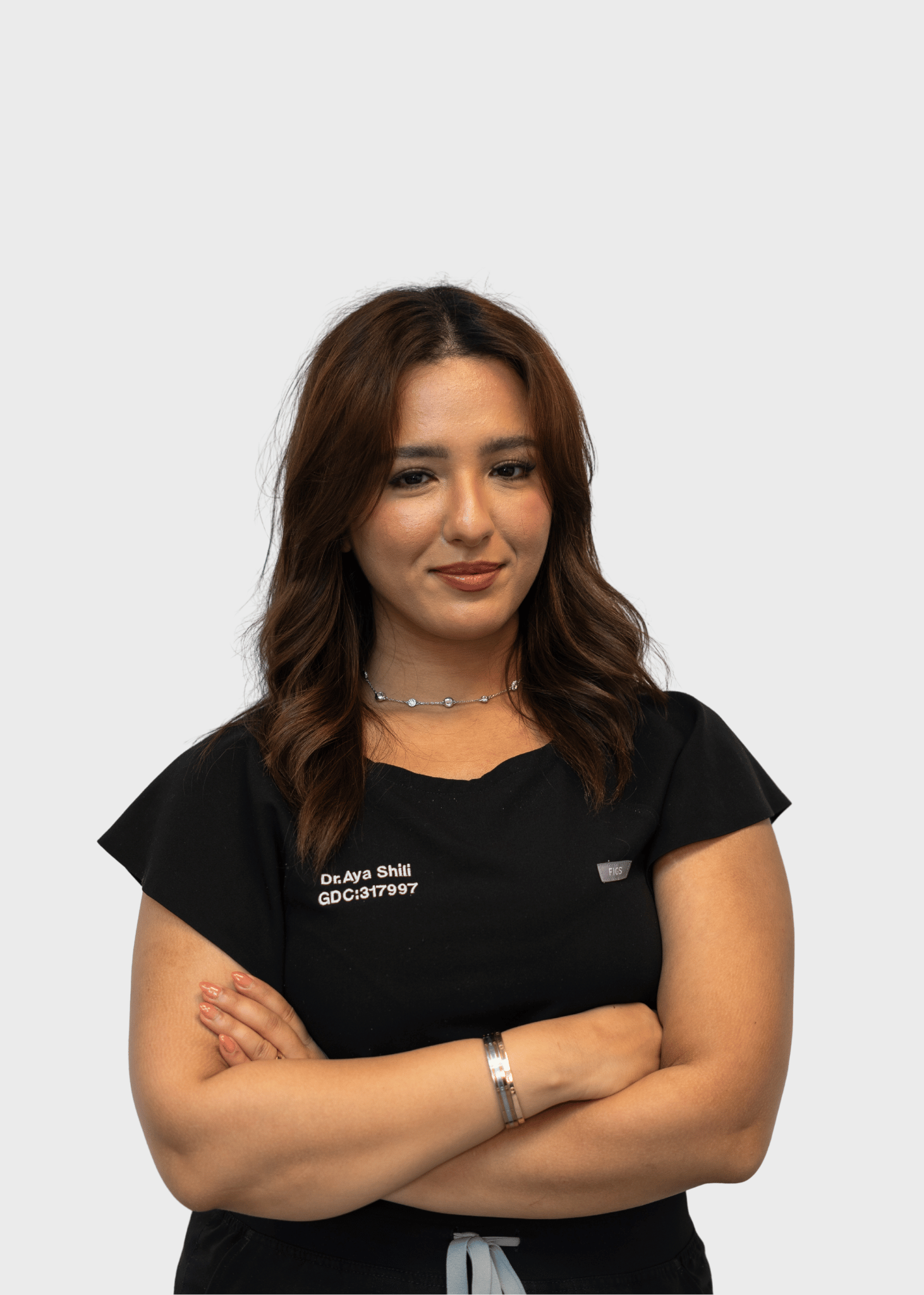 Portrait of Dr Aya Shili, dentist at KY Dental Studio