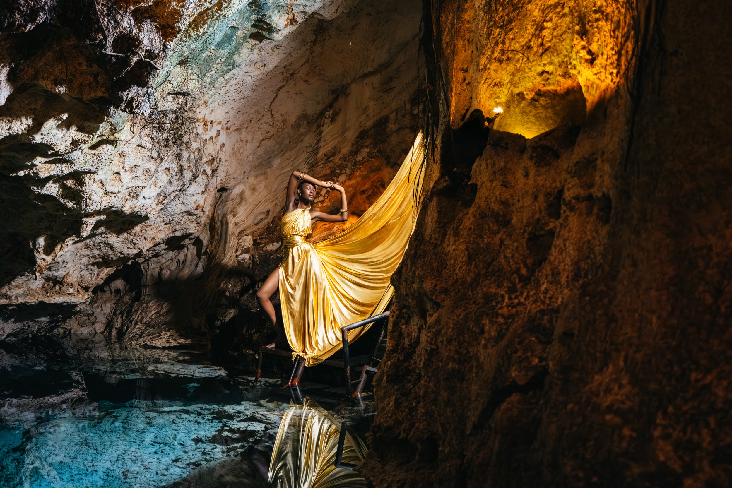 Professional model photography session at the natural underground beauty of Paje Cave, Zanzibar.