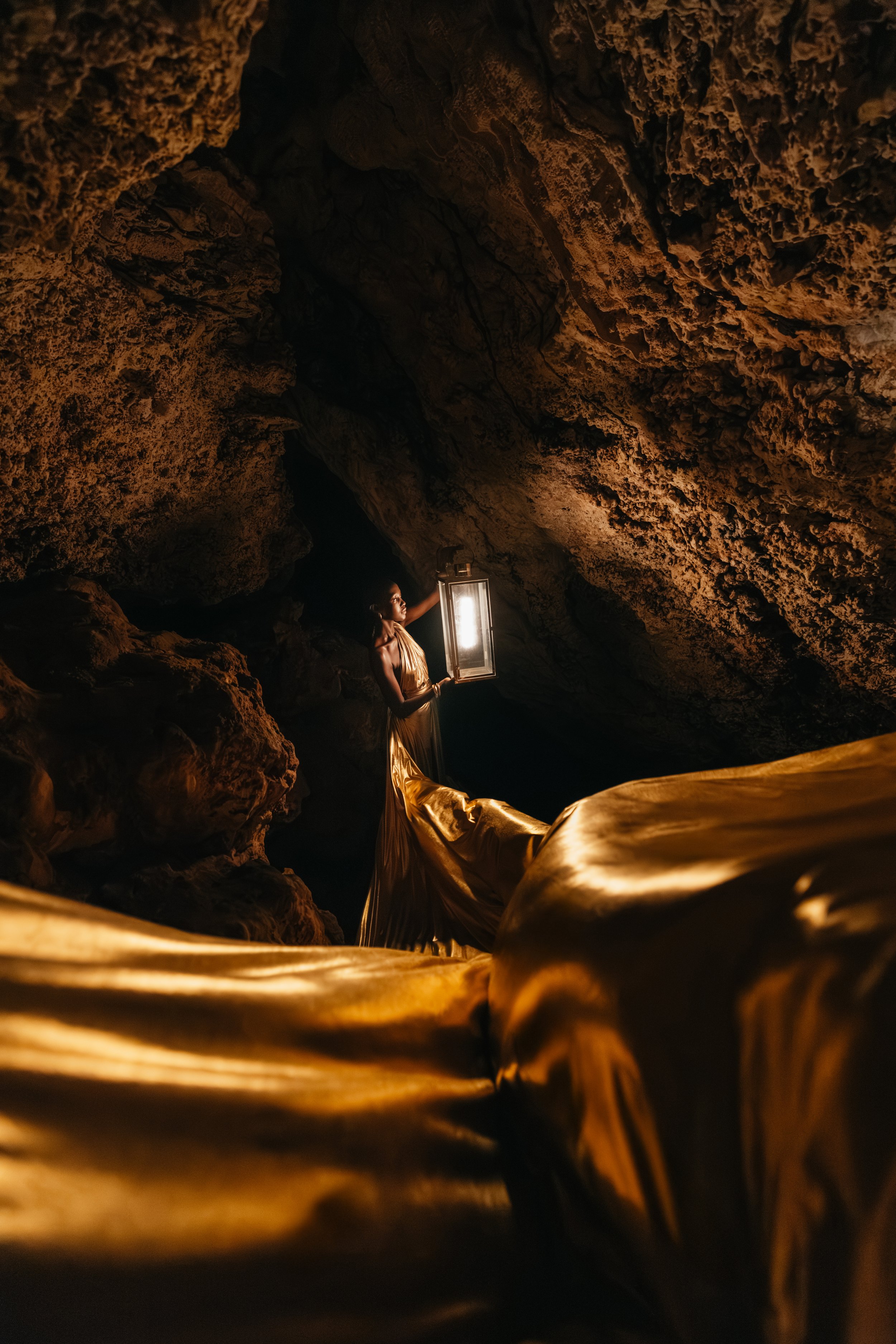 Fashion model posing during a professional photoshoot at the stunning Paje Cave in Zanzibar.