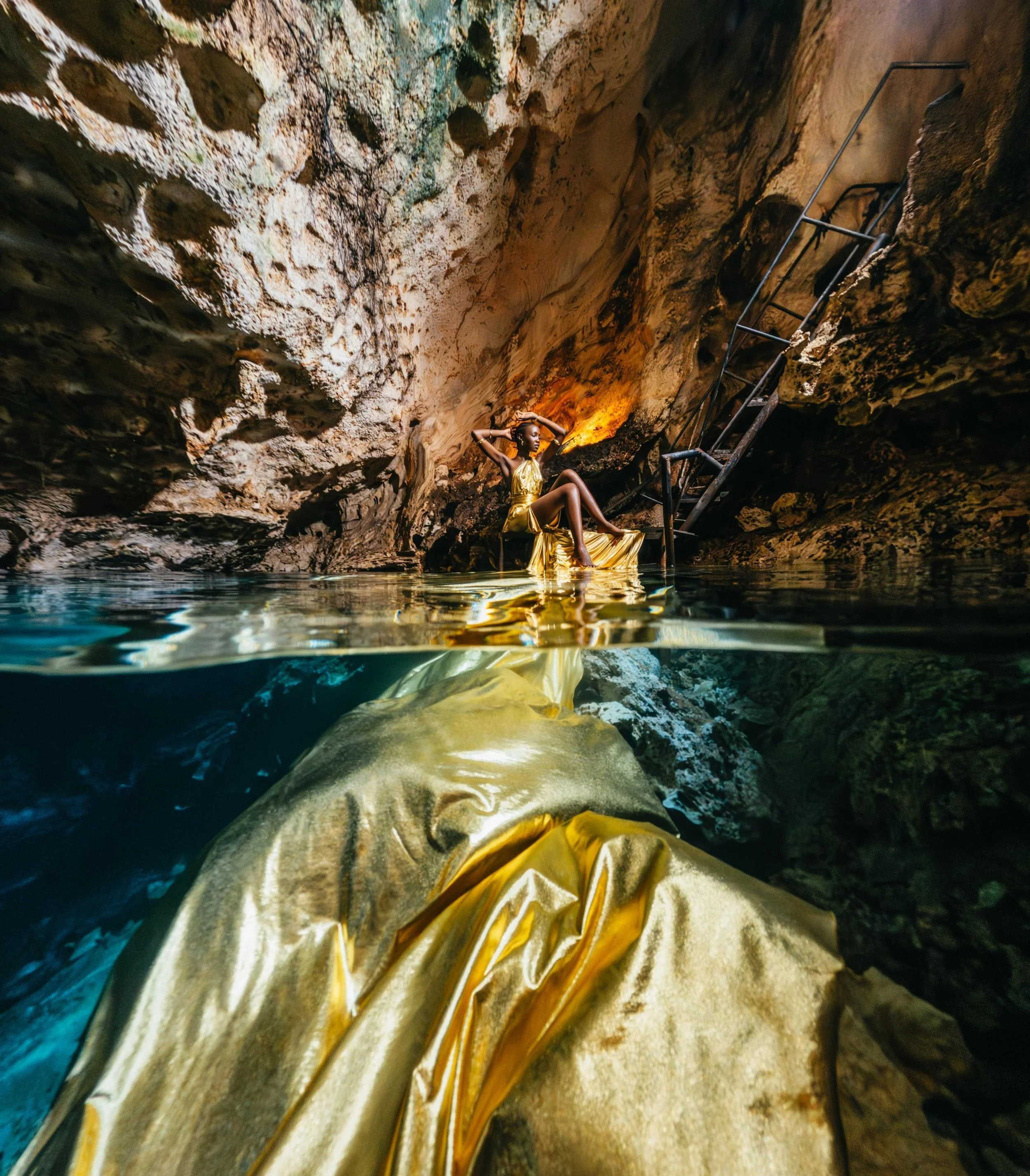 Stunning reflections on the crystal-clear water inside Paje Cave, Zanzibar.