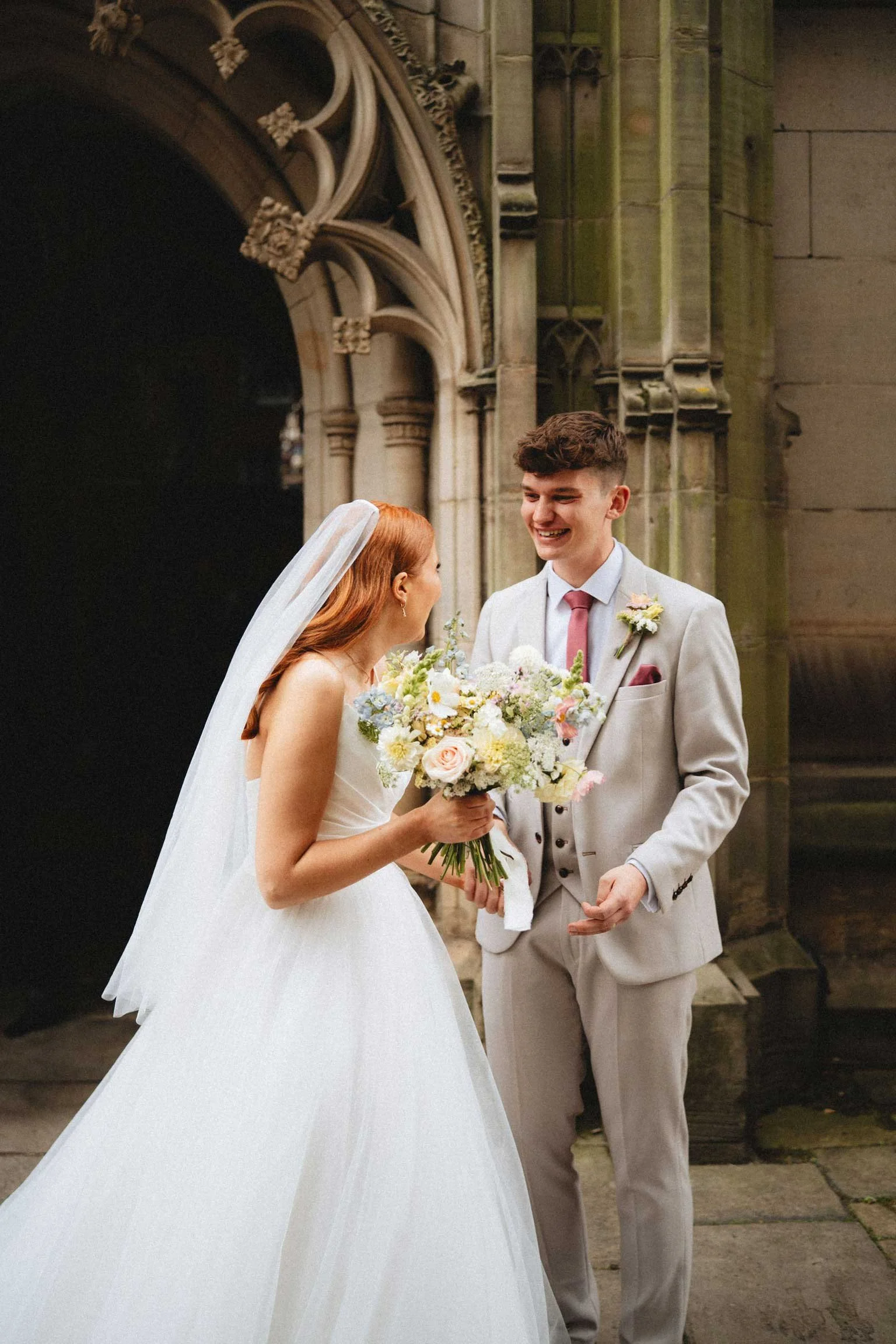 Couple-&-bouquet-outside-church-.jpg