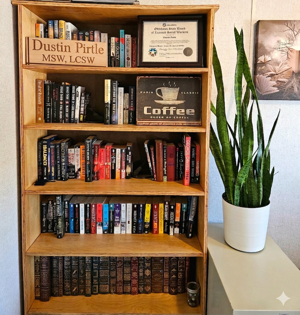Professional counseling credentials and clinical library in an Oklahoma private practice office